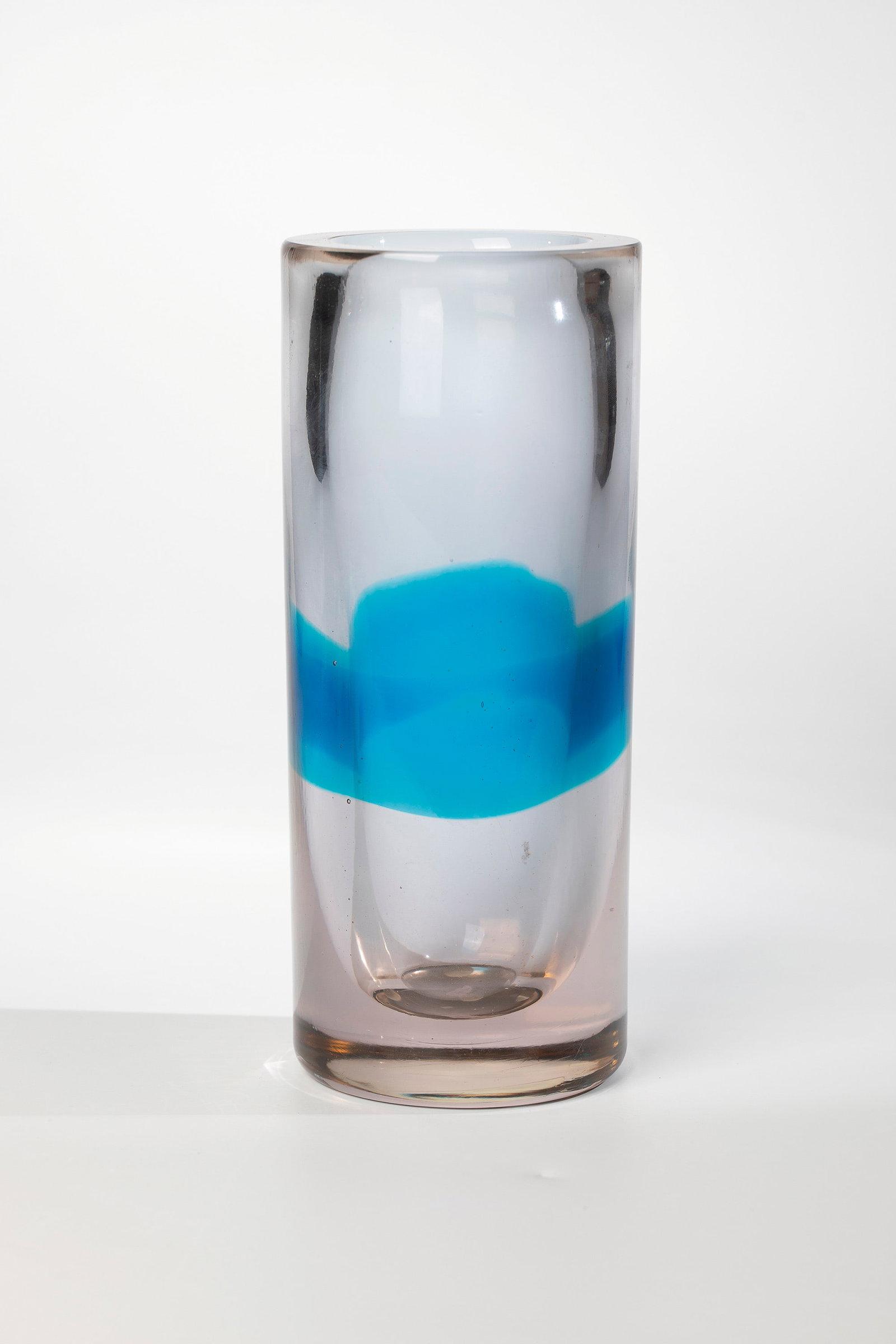 Vase ''Sommerso'': Vase ''Sommerso'' Antonio Da Ros (design), Vetreria Gino Cenedese, Murano, c. 1963 Thick-walled, Anna-yellow glass with horizontal ribbon melting in blue. H. 24.5 cm. Under UV light, the vase appears