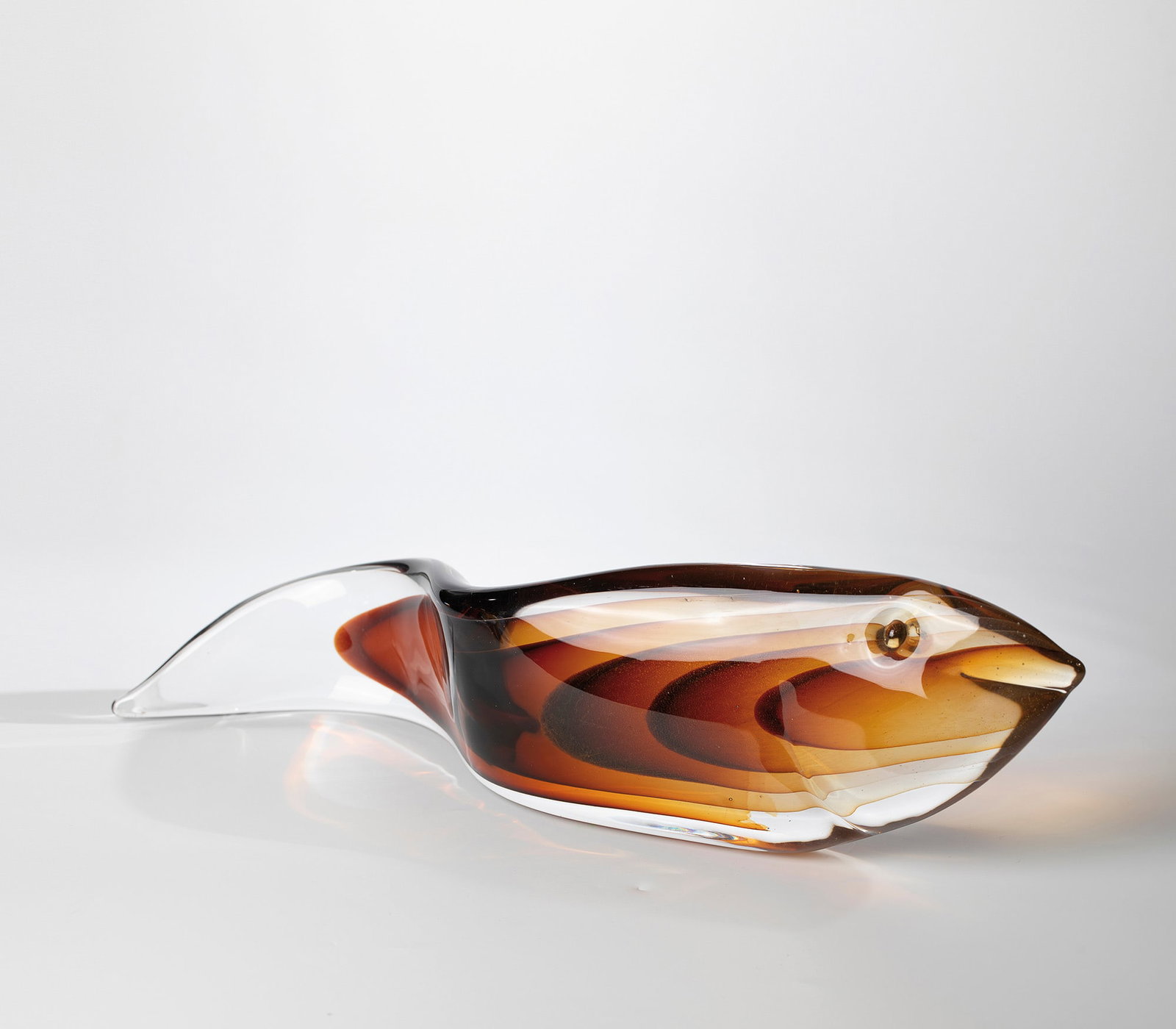 Figurine ''Eel'': Figure ''Eel'' Antonio da Ros (design), Gino Cenedese, Murano, c. 1955 Colourless glass with underlays in brown ('Sommerso'). H. 14 cm; L. 55 cm.Please note that this object is subject to standard tax