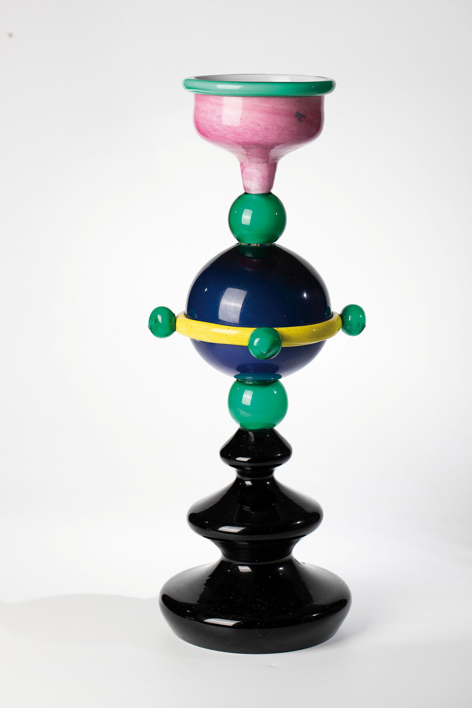 Object: Object Peter Shire (design), Vetreria Vistosi, Murano, c. 1990 Clear and coloured glass, partly underpinned with white opal. With multi-coloured powder melting and appliqués, fused. Original manufact