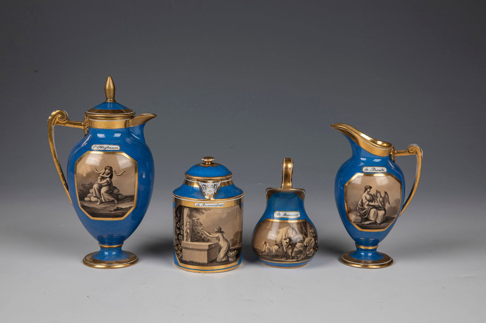 Four pots from one set: Four pots from a set Vienna, 1802-08 vase-shaped or urn-shaped, partly on foot. All pots with raised, gilded handles. Sky blue background. Six gold-rimmed octagonal reserves. In it with very fine sepi