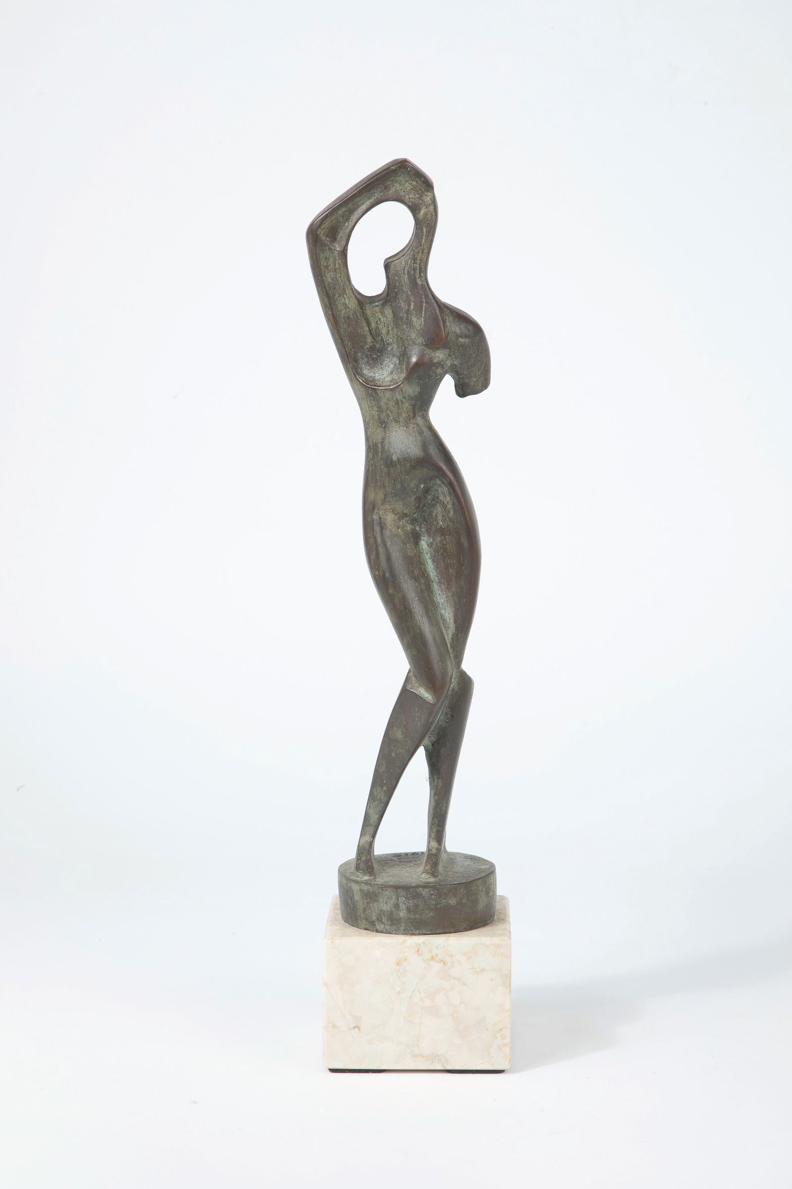 by Alexander Archipenko: after Alexander Archipenko 1887 Kiev - 1964 New York Bronze, patinated. Cubist standing female nude mounted on a square marble base on a round stand. There it is inscribed: ''Archipenko'' and the year