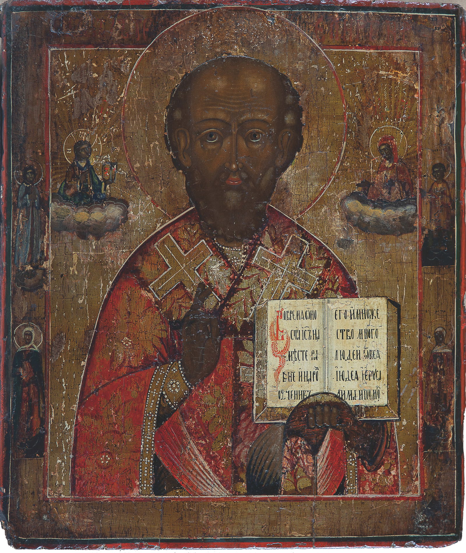 Icon with St. Nicholas: Icon with St. Nicholas Russia, 19th century, composite of two wooden planks with two front sponki (one lost). Tempera on chalk ground, gilded background. 4 marginal saints. Partially restored. 35x29.5
