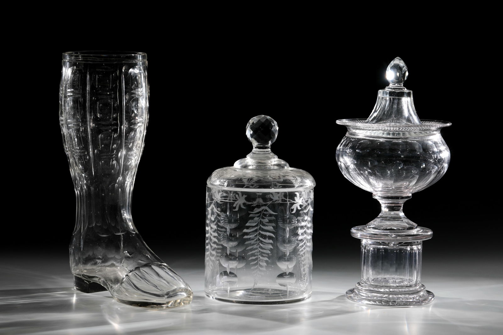 Mixed lot of two lidded vessels and a drinking boot (1 of 2)