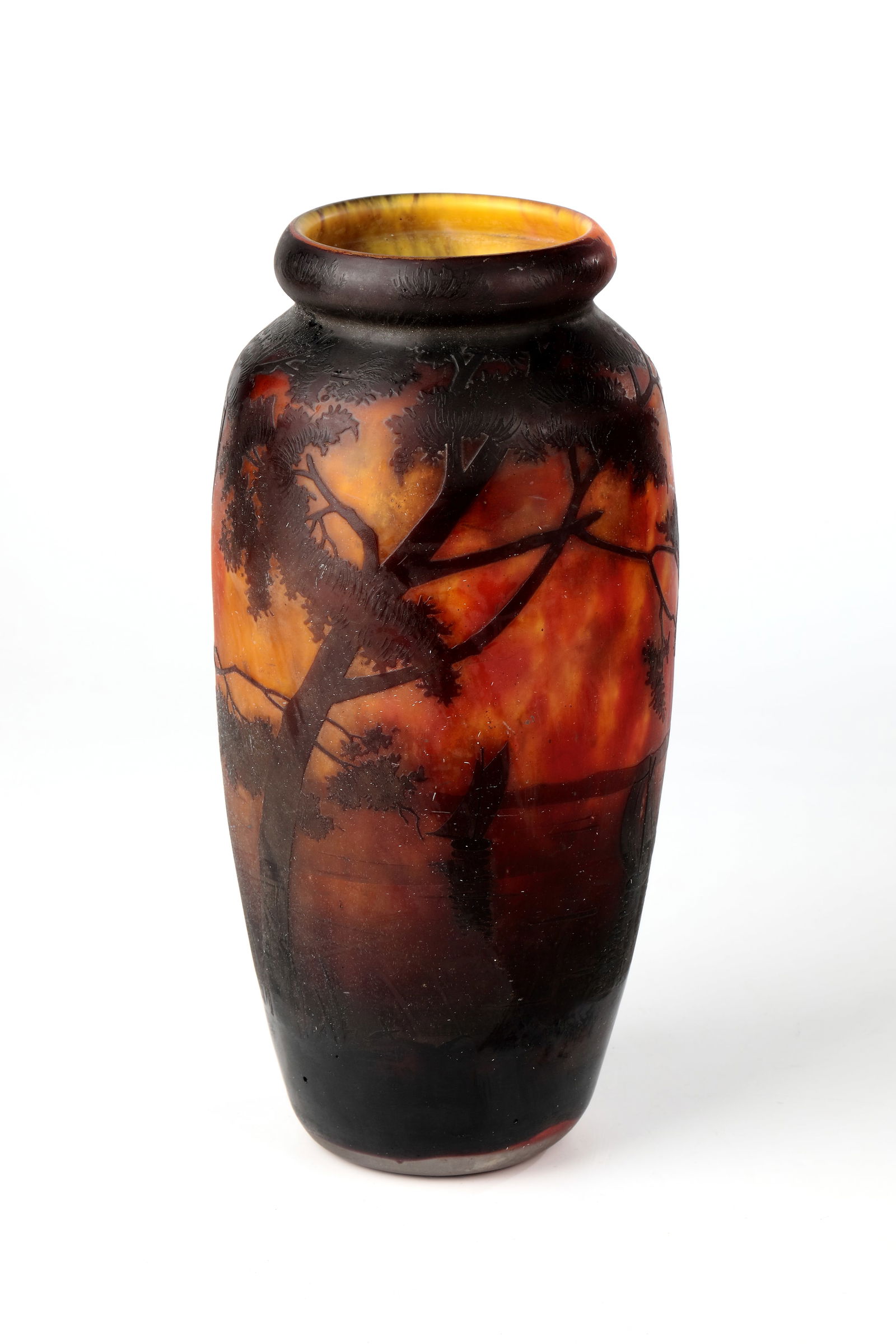 Vase with lake landscape: Vase with Lake Landscape Daum Frères, Nancy, around 1914 Colourless glass with powdered and melted in yellow, orange and violet. Etched decoration in relief all around the wall: seascape with sai