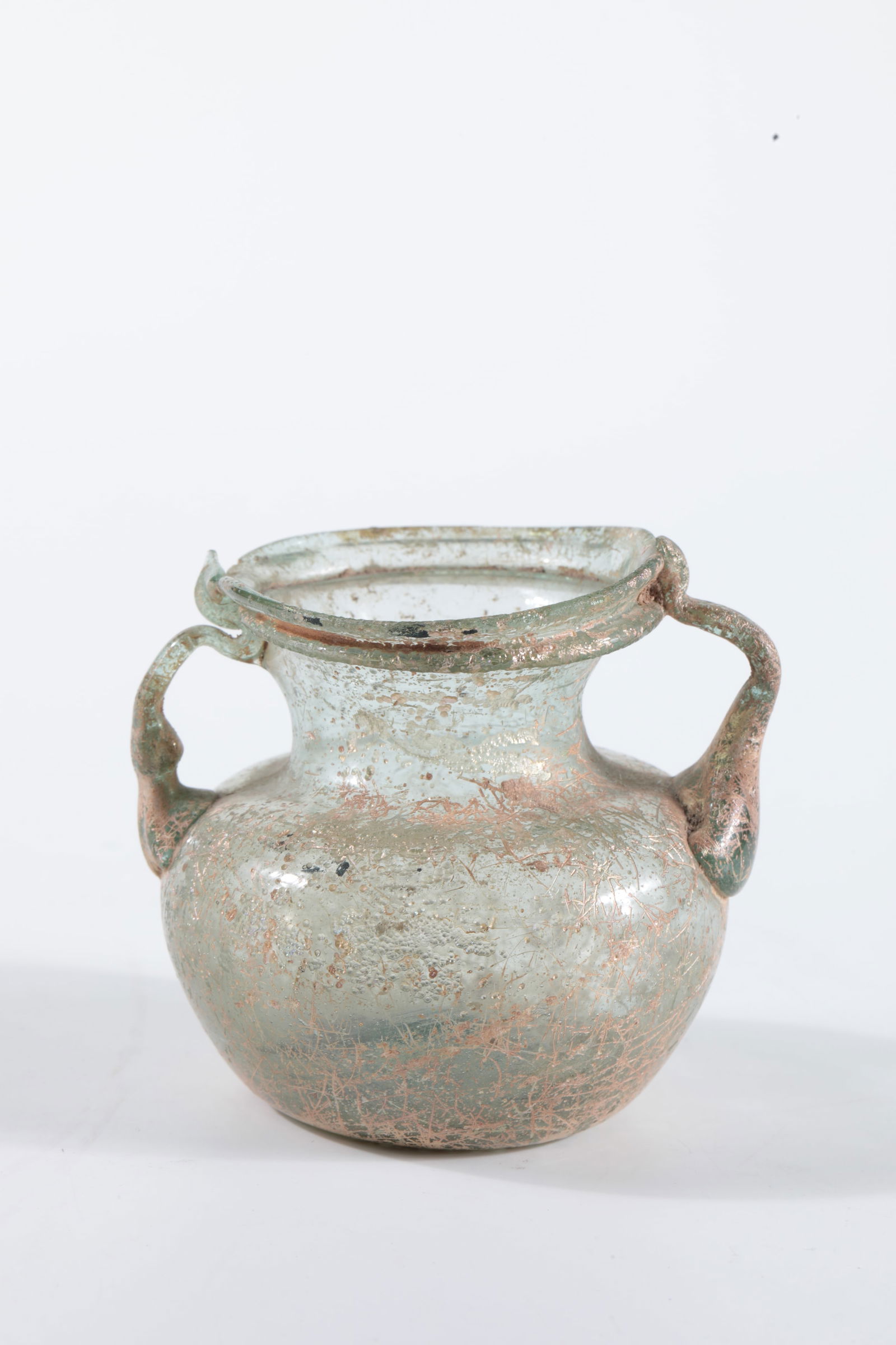 Double-handled vessel: Double-handled vessel Mediterranean region, probably Italy 1st century BC excavation. Light green, thin-walled glass with tear-off. Bulbous wall with two appliquéd handles. Below the edge of the