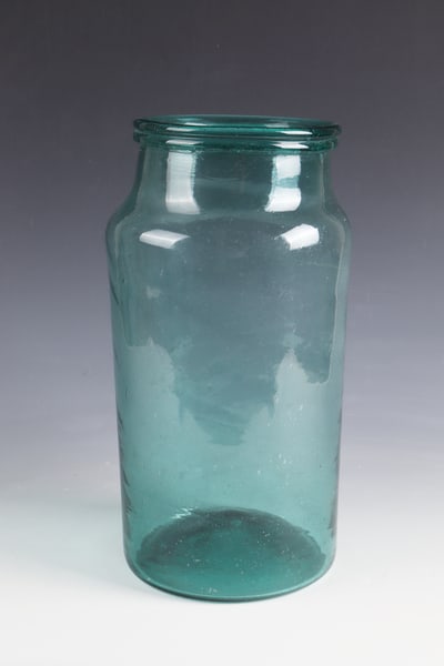 Storage vessel: Storage vessel France, 18th century Light green glass with raised bottom and demolition. Cylindrical wall. Muzzle rim folded downwards. H. 34 cm