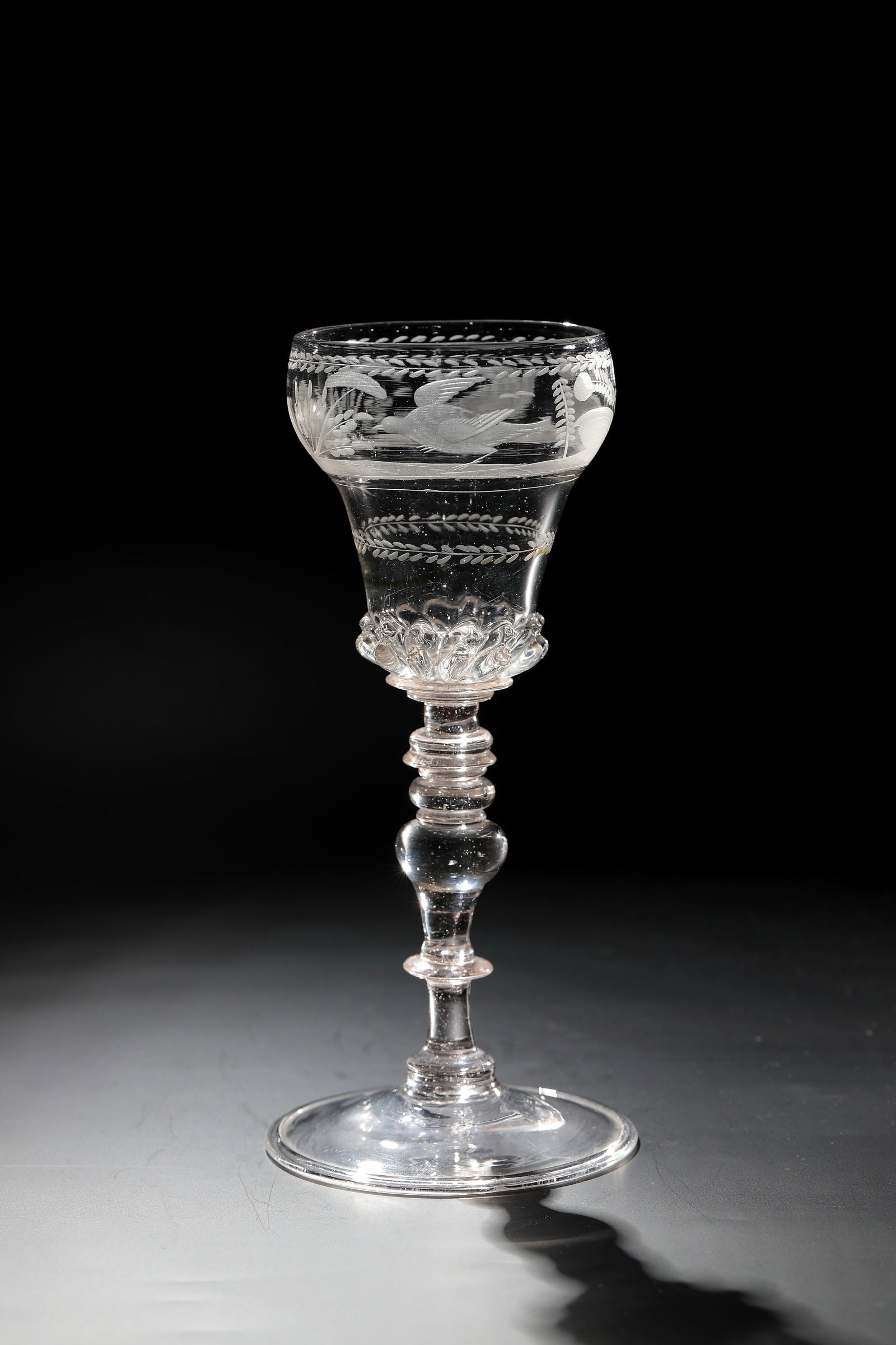 Cup: Giant Mountains Cup around 1700 Raised disc base with tear-off and upturned edge. Articulated shaft consisting of baluster between pressed ball nodi and annular discs. At the base of the widened cuppa