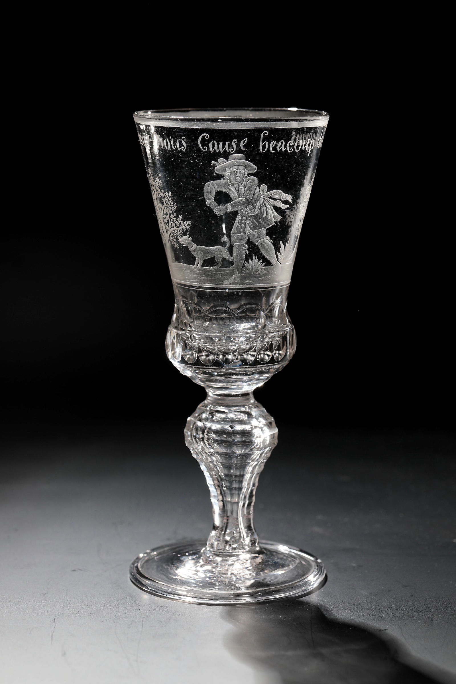 Cup with love lament: Goblet with love lament Saxony, 1st half of the 18th century Colourless glass with tear-off. Disc base with the edge folded downwards. Hollow baluster shaft and base of the bell-shaped cuppa faceted.