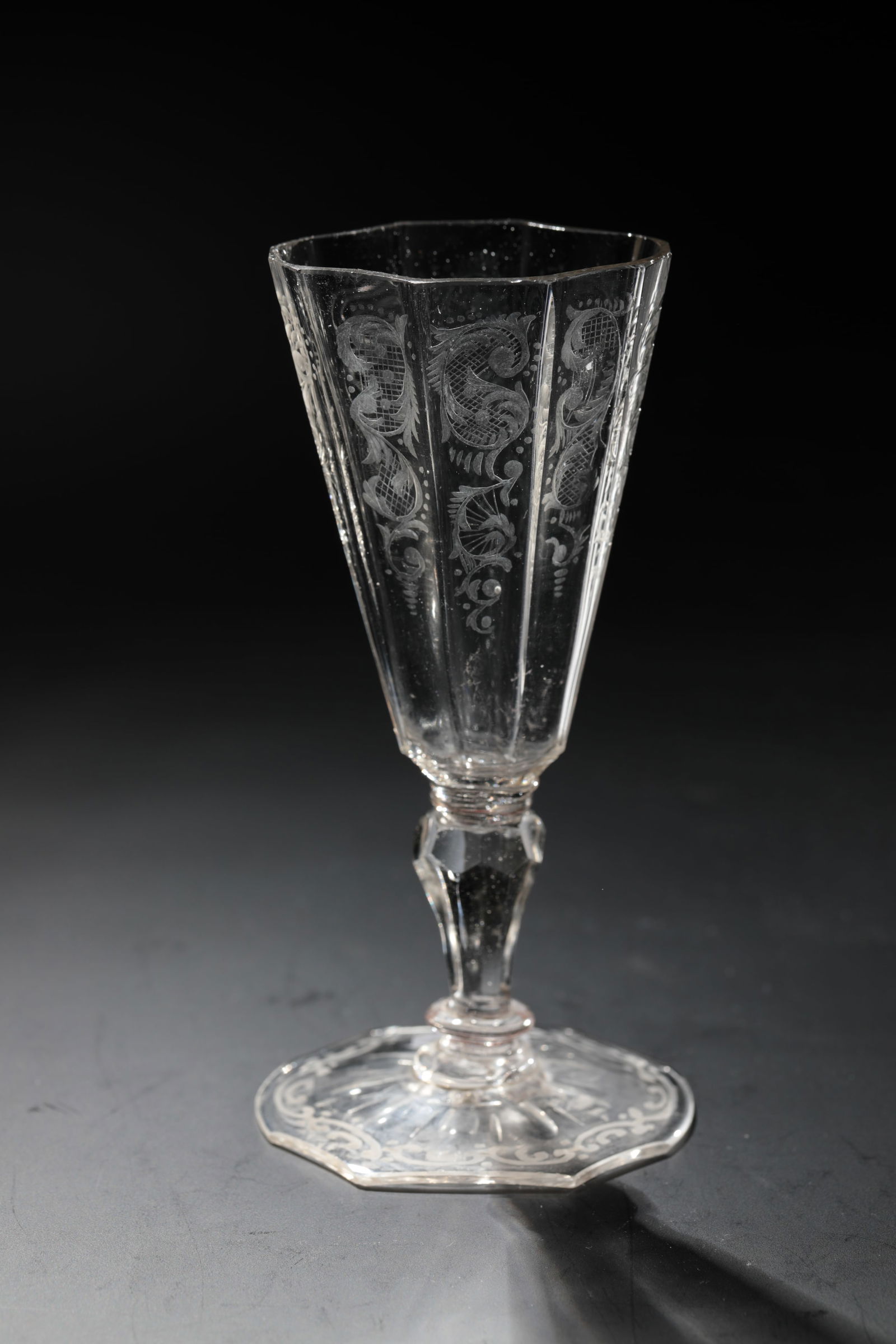 Small cup: Small Silesian Goblet, 18th century Colourless glass. Foot and conically widened cuppa octagonal with four retracted sides. Rosette-cut underfoot. Foot top and cuppa with finely cut, baroque decorativ