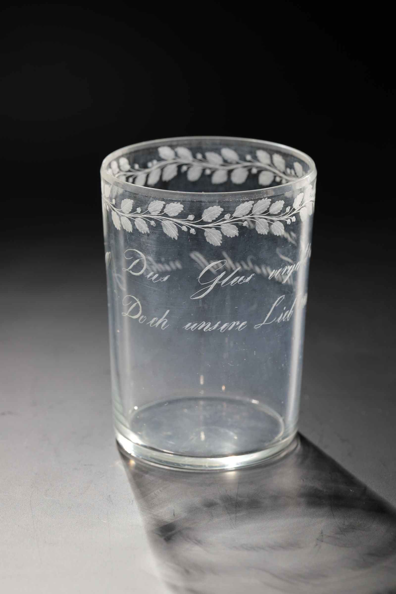 Friendship Mug: Friendship Mug Germany. 19th century Colourless glass. On the cylindrical wall in very accurate cut inscription: "The glass decays and breaks. But not our love and friendship." Below the lip edge,