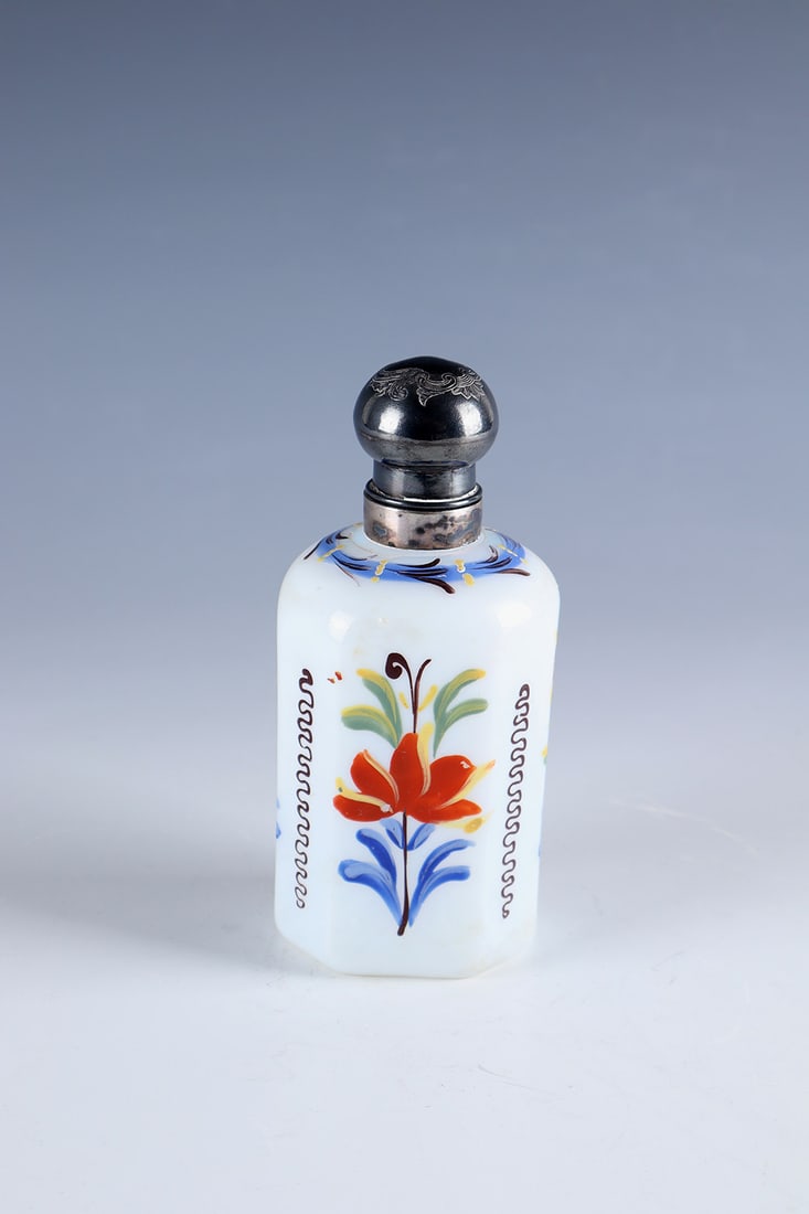 Liquor bottle with silver screw cap: Schnapps bottle with silver screw cap Bohemia, 2nd half of the 18th century, frosted glass with tear-off. On the cross-section rectangular wall with bevelled corners, stylized floral décor in