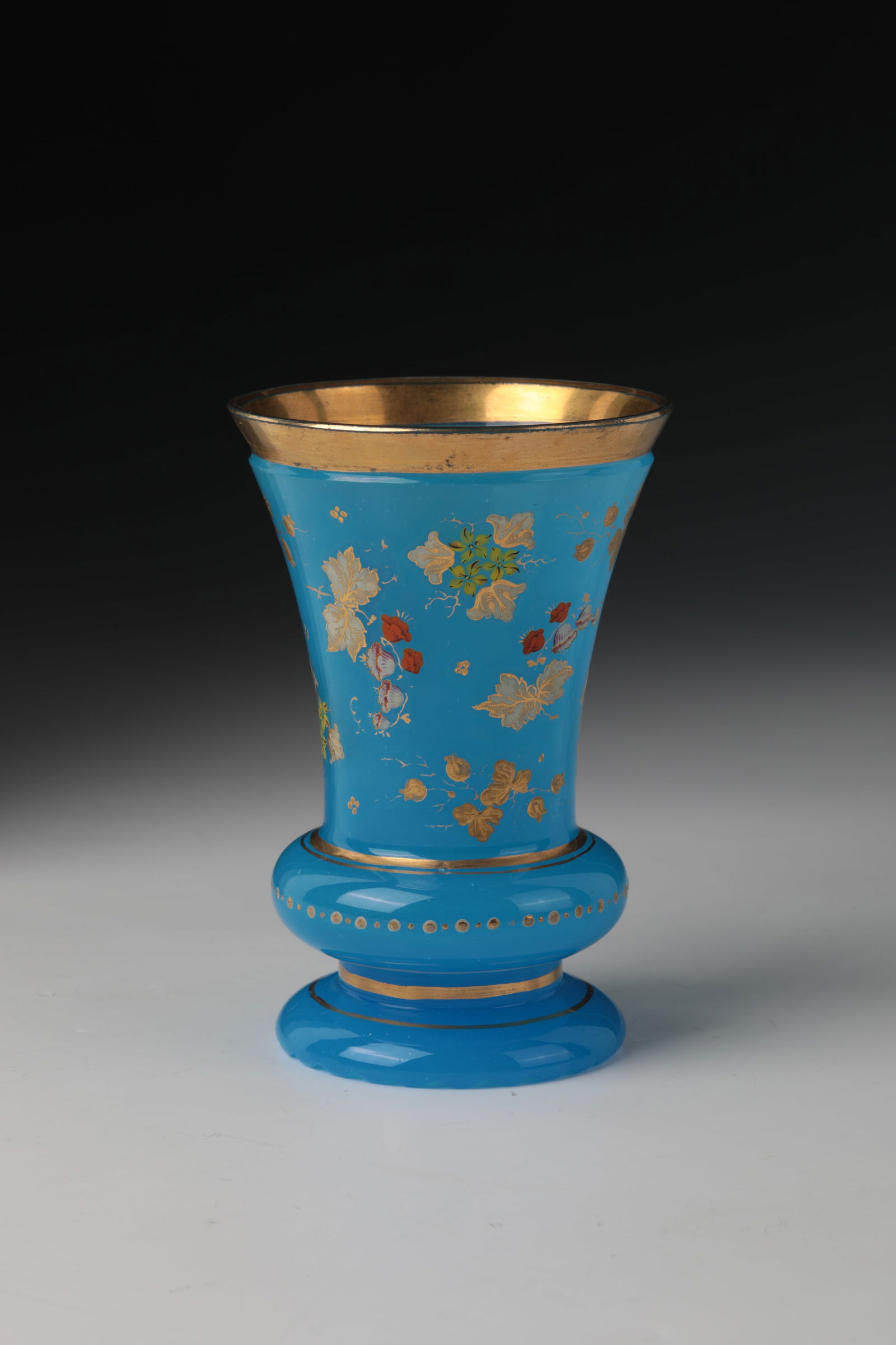 Foot cup: Foot cup Bohemia, mid-19th century Blue alabaster glass. Polished back. On the curved wall with gold lines and gold dot decoration, which protrudes at the base, flower and leaf tendrils in polychrome