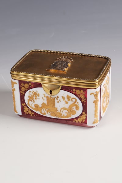 Lidded box with coat of arms: Lidded box with coat of arms of Bohemia, c. 1860 Rectangular body. Colourless glass with gold ruby underlay and tin enamel overlay. On the polished wall, tendril and floral decoration in enamel and