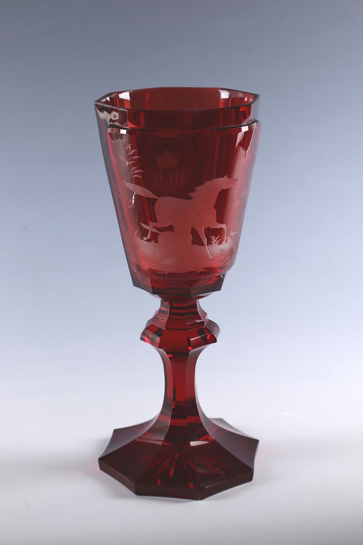 Cup with horse and foal: Goblet with horse and foal Karl Pfohl, Steinschönau (slated), dated 1853 Colourless, ruby-red glazed glass. Back with notched star. Faceted foot, shaft and cuppa. On the wall, a frontal high-cut
