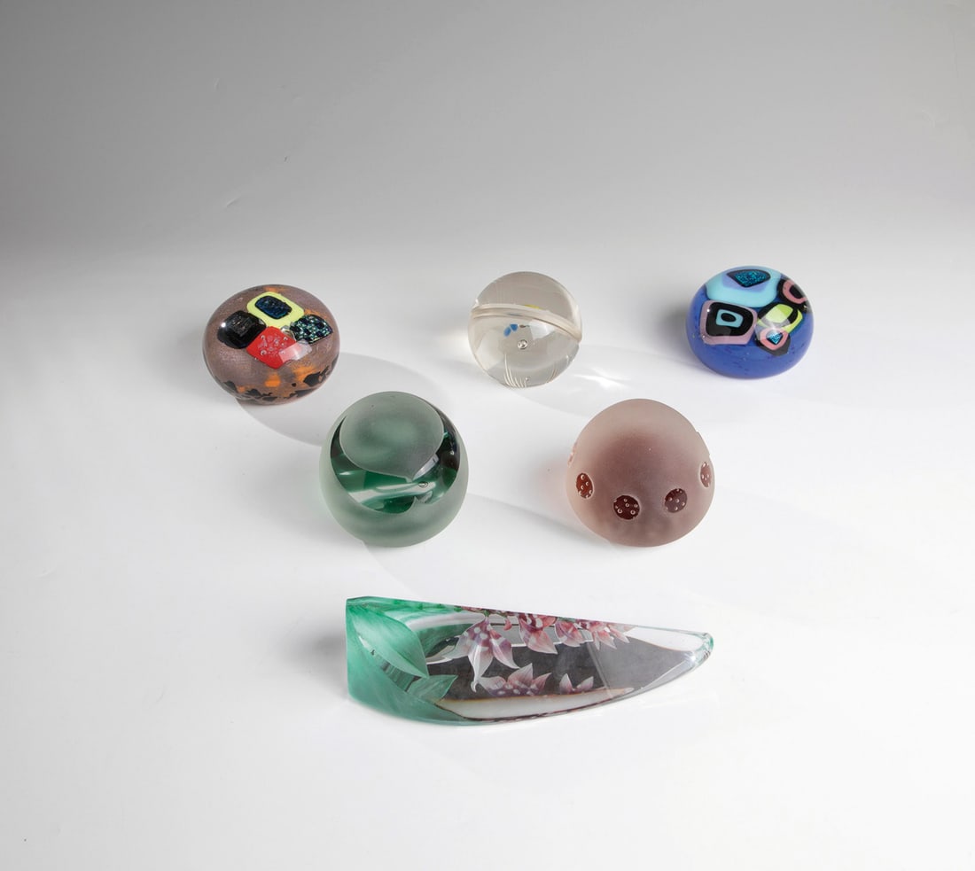 Six paperweights: Six paperweights 20th/21st century Three paperweights from the Atelier Männerhaut with signature on the bottom, one of which is also signed by G. Jo Hruschka. One paperweight signed ''M7Sweden 3819''