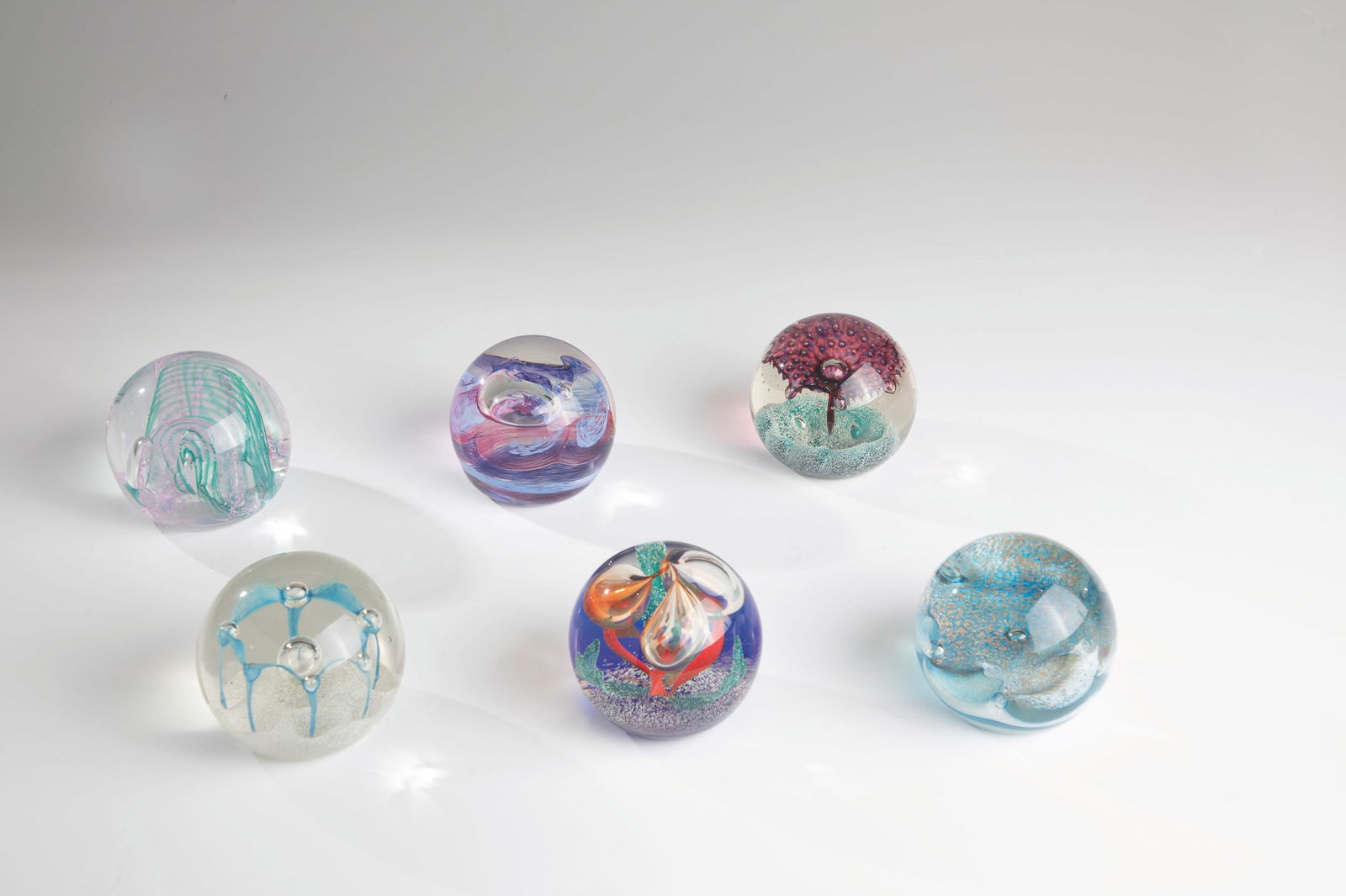 Six paperweights: Six paperweights Caithness, Scotland, 20th century Six paperweights with different decorations. All on the bottom with the signature ''Caithness Scotland'' and the designations