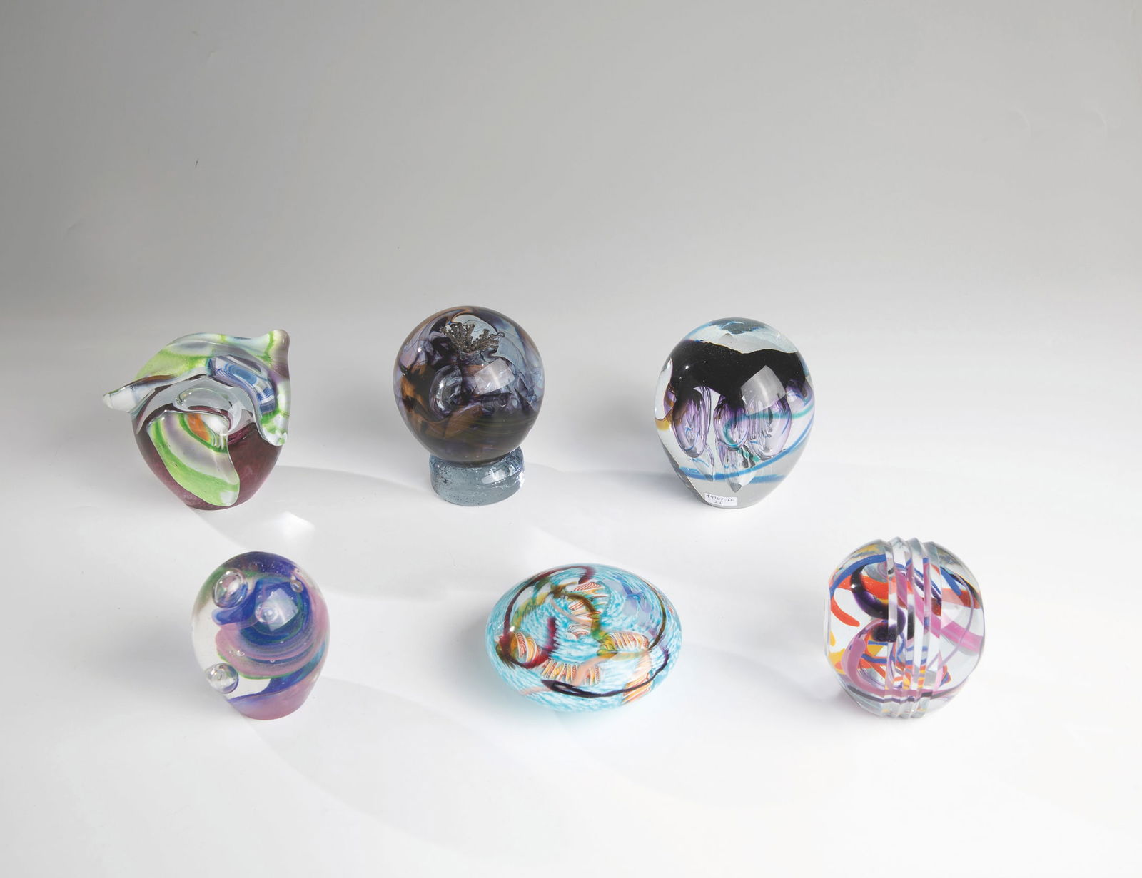 Six paperweights: Six Paperweights Lemberger, 1991-1997 Six paperweights by Walter Lemberger, all signed on the bottom with ''Lemberger W.'' and a year. D.6.0-9.7cm H.5.2-10.7cm.