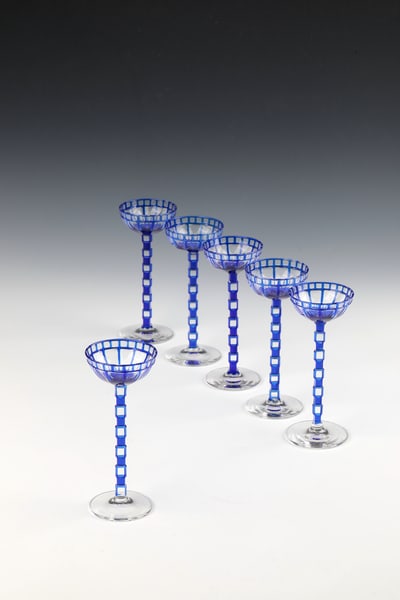 Set of six liqueur glasses: Set of six liqueur glasses Otto Prutscher (design), Meyr's Neffe, Adolf bei Winterberg (execution), E. Bakalowits & Söhne, Vienna (publisher), 1906 Colourless glass. Shaft and cuppa cobalt blue