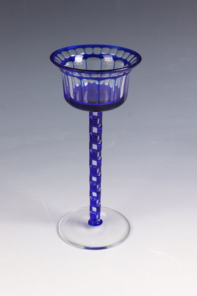 Wine glass: Wine glass L. Moser & Söhne, Karlsbad, 2nd half of the 20th century, designed by Otto Prutscher Colourless, cobalt blue overlaid glass. Stem shaft decorated with offset cut ashlar pattern. The cuppa