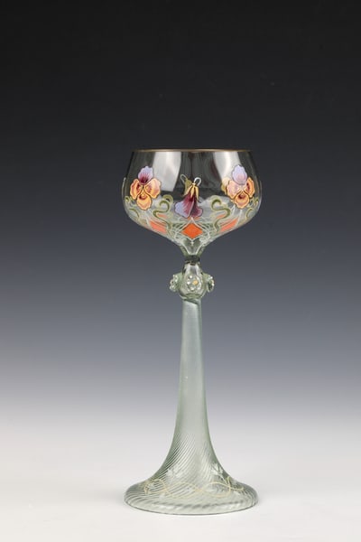 Rare wine glass: Rare wine glass Rudolf Czerny (design), Karl Heller (painting), rain hut, c. 1900 Light green, partly diagonally ribbed glass with colourful opaque enamel decoration: flower and leaf stylisation in