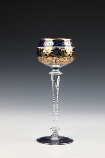 Wine glass ''Jodhpur'': Wine glass ''Jodhpur'' Fritz Heckert, Petersdorf, around 1900 Colourless glass with polychrome, transparent enamel and polished gold painting; ornamentalflooral décor. Six-faceted stem shaft with