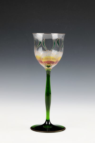 Wine glass: Wine glass crystal glass manufactory Theresienthal, around 1900 feet and shaft made of green glass. Optically blown cuppa made of colourless glass, surrounded by gold-contoured transparent enamel