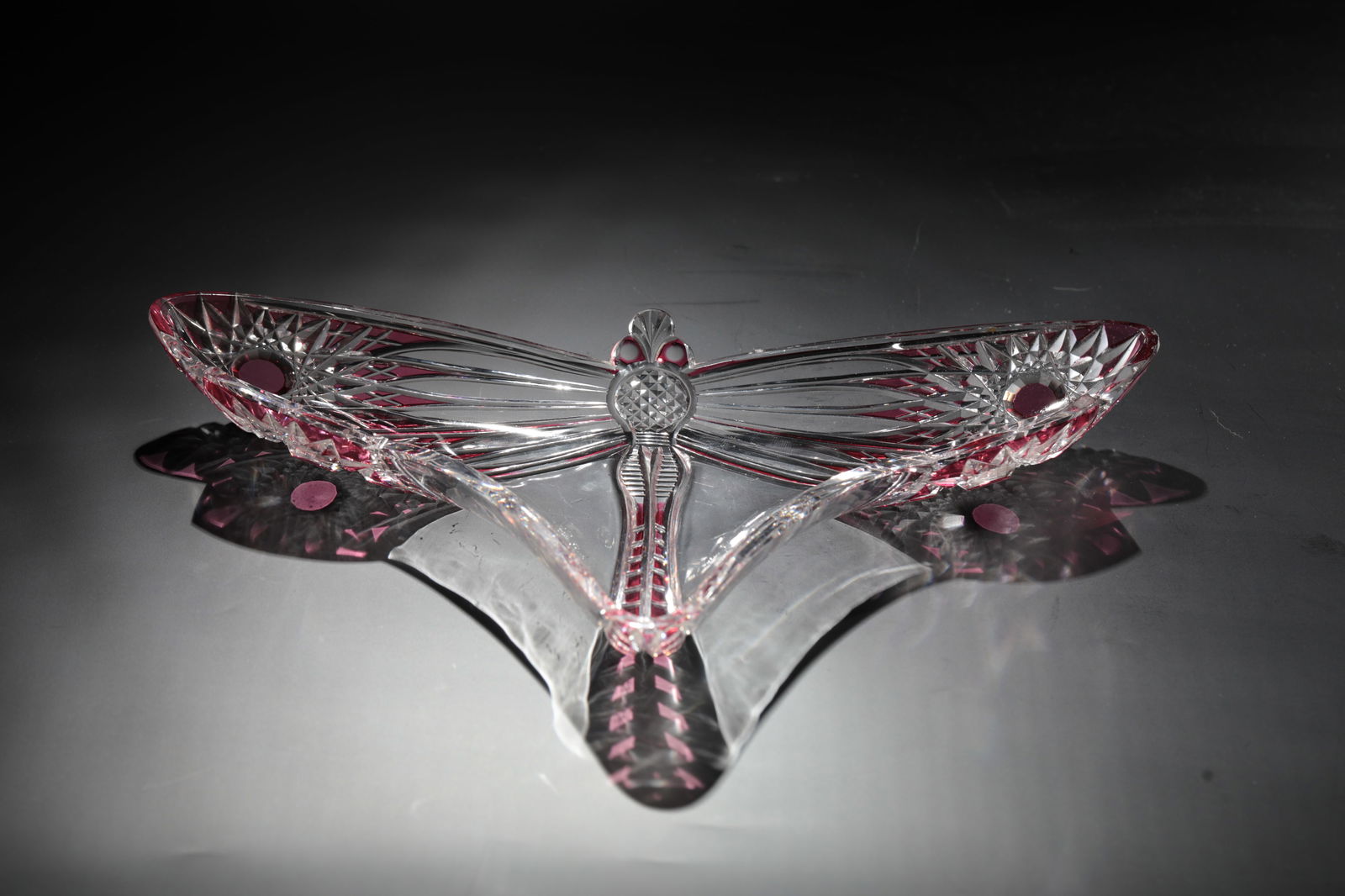 Dragonfly Bowl: Dragonfly bowl Cristalleries de Baccarat, 1904 Colorless, ruby pink overlaid glass, cut. 3.6 x 33 x 20 cm Lit.: G. Cappa, Le Génie Verrier de l'Europe, ed.: Mardaga, 1998, fig.292 This design was