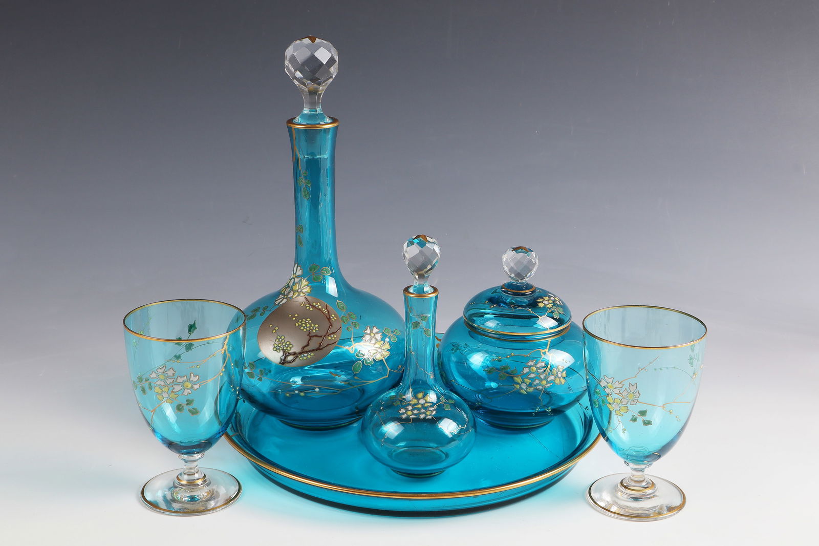 Six-Piece Water Service with Japonizing Decor: Six-piece water service with japonizing decoration Cristalleries de Baccarat, 1880 - 1884 Consisting of: tray (d. 25 cm), 2 carafes with stoppers (h. 25, 5 or 15.5 cm), sugar bowl (h. 12.5 cm) and 2