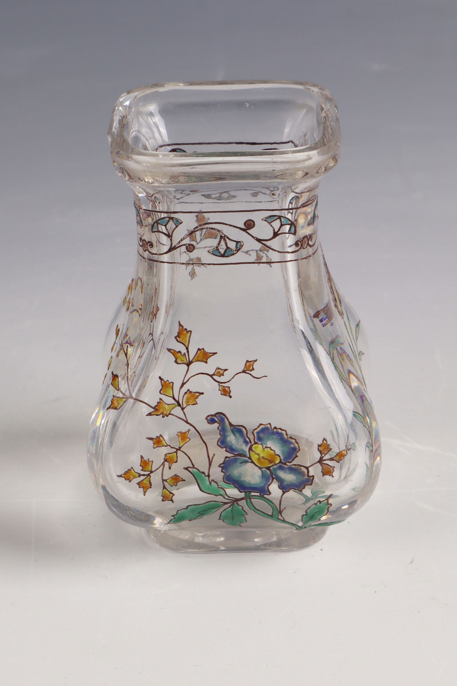 Vase with flower branch: Vase with flower branch Cristalleries de Baccarat, model 1878 - décor 1884 Colourless glass with colourful opaque enamel. H. 10 cm Lit.: G. Cappa, Le Genié Verrier de l'Europe, ed.: Mardaga, 1998,