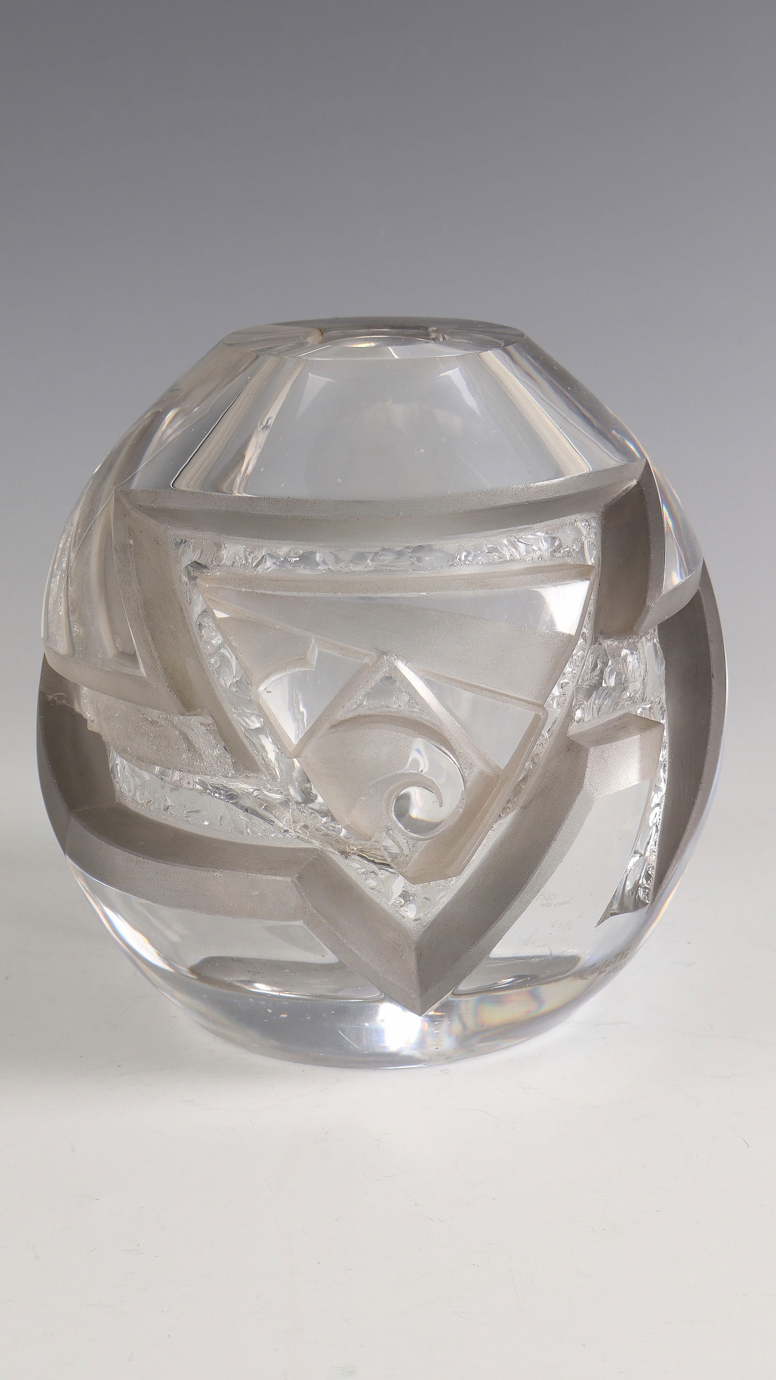 Rare Vase: Rare Vase Aristide Colotte, 1927 - 1930 Colourless, thick-walled glass. The geometric décor is carved out in a rough wedge cut and partially chiseled. Partly polished and left matte. Ref.: COLOTTE