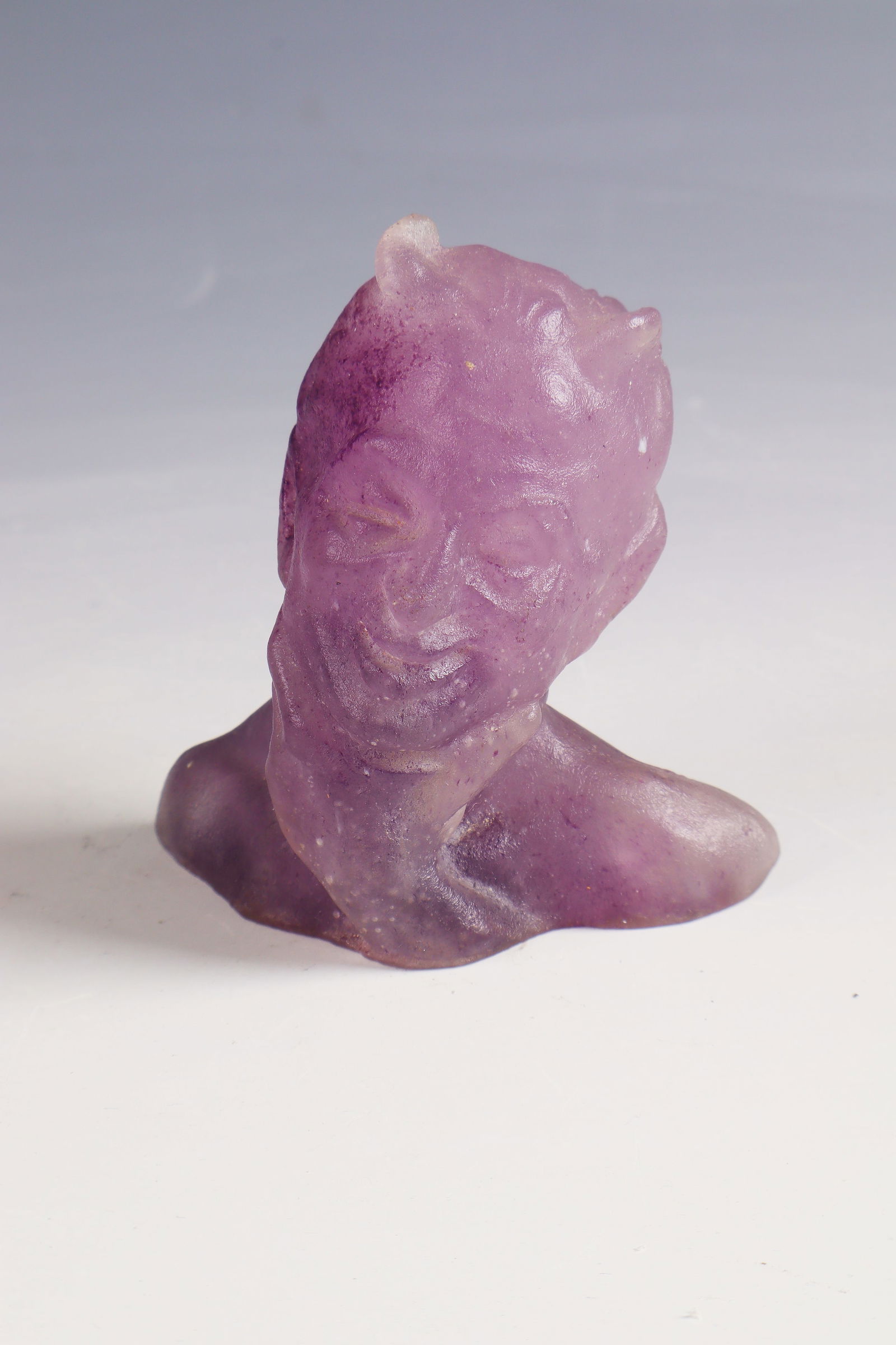 Faun bust: Faun bust Georges Despret, c. 1906 Pâte de verre in colourless and violet, moulded. Reference: G. Despret (in blue-grey enamel). H. 9 cm Lit.: G. Cappa, Le Genié Verrier de l'Europe, ed.: Mardaga,