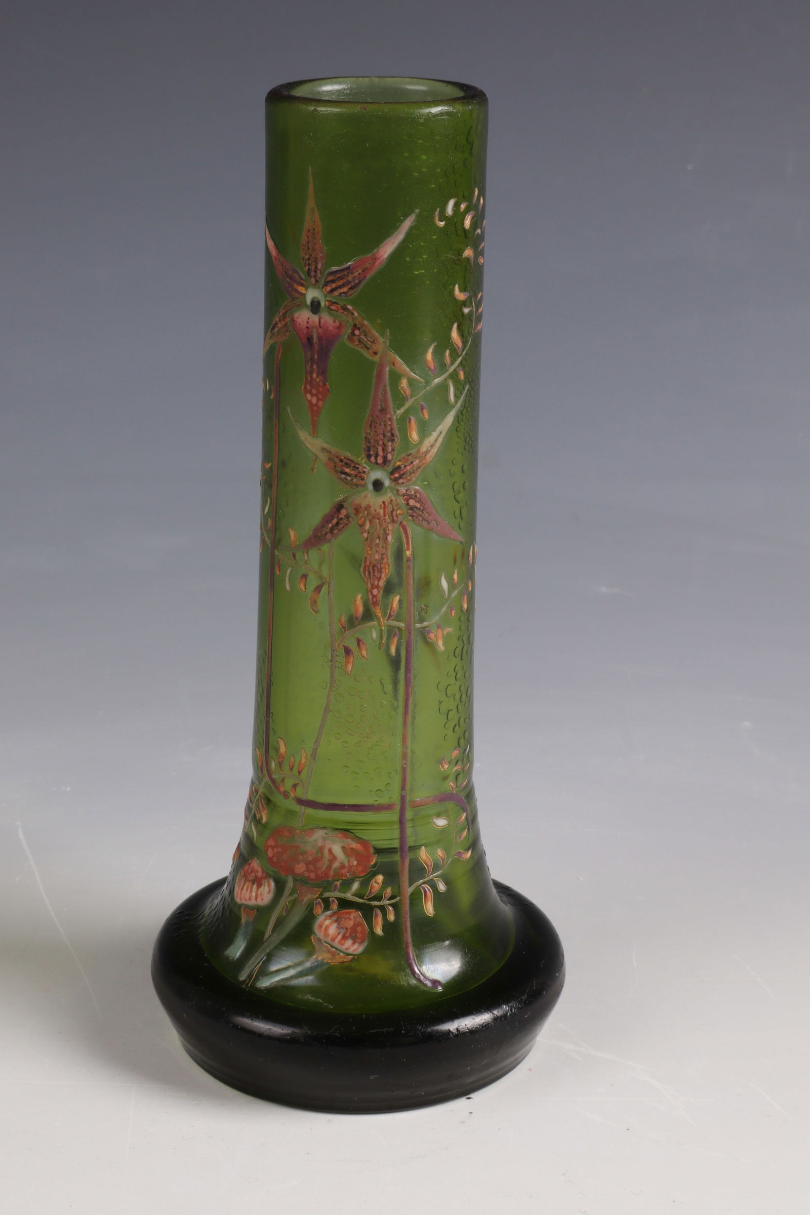 Vase ''Orchidées sauvages et champignons'': Vase ''Orchidées sauvages et champignons'' Emile Gallé, Nancy, circa 1884 Green glass with colorful opaque enamel decoration. Surface with scattered highly etched polka dots. Underside inscribed:
