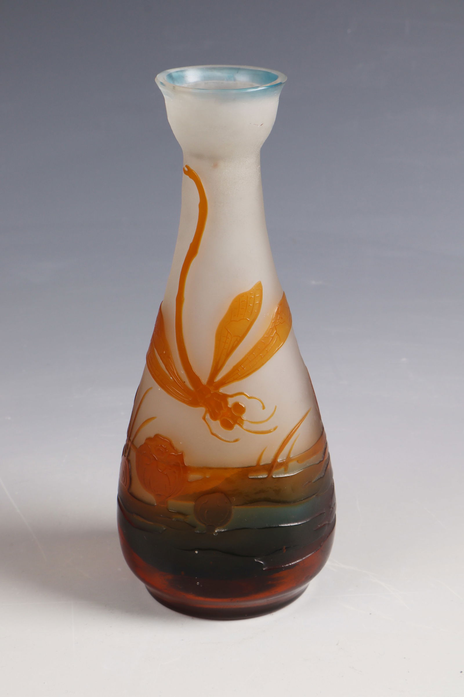 Vase with dragonfly ''Libellule sur étang aux nénuphars'': Vase with dragonfly ''Libellule sur étang aux nénuphars'' Emile Gallé, Nancy, 1904 Colourless glass, gradient blue underlay, orange-brown overlay. Relief etched décor. On the wall inscribed: