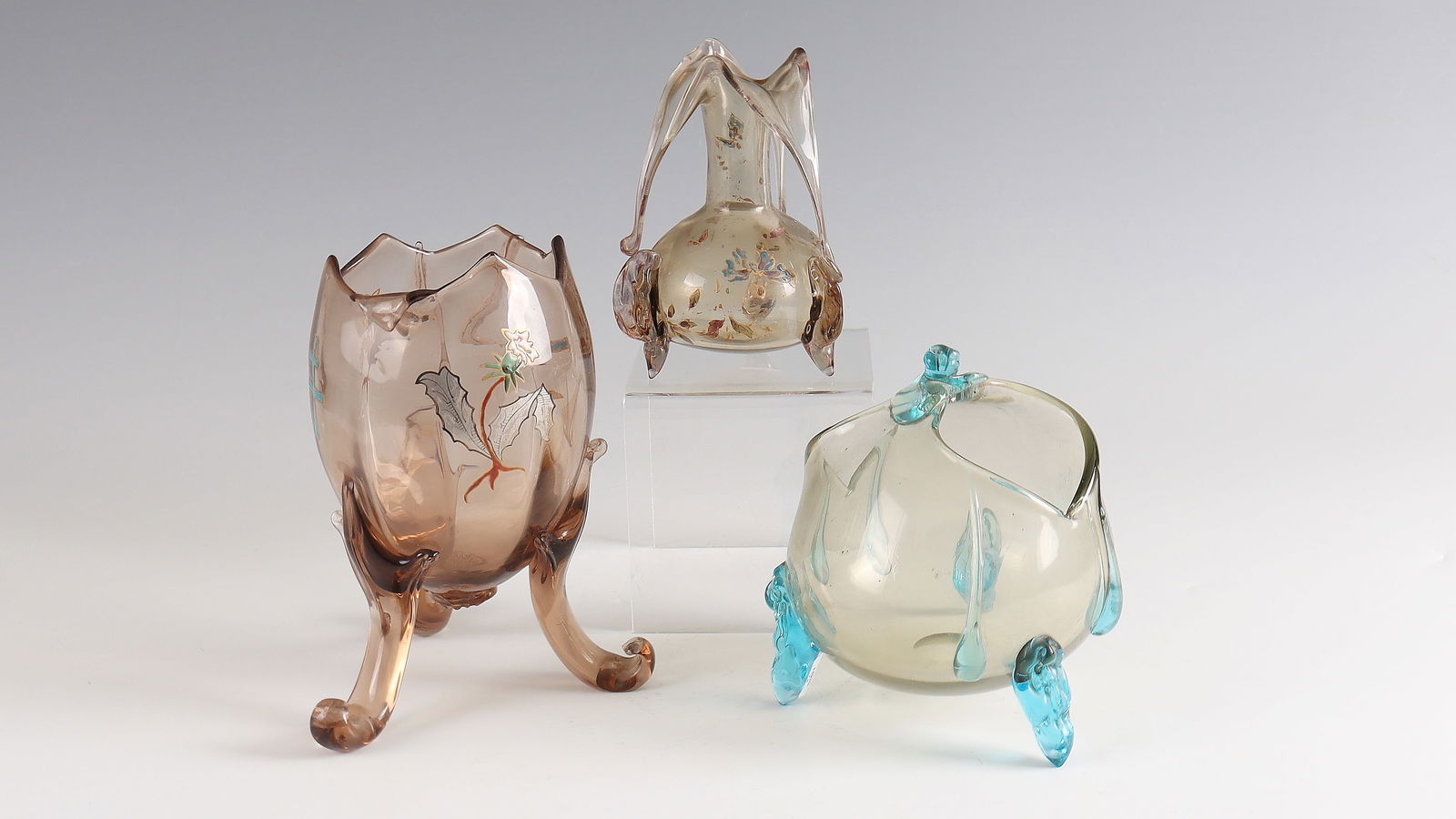 3 vases with appliqués: 3 vases with appliqués Auguste Jean, 1882 - 1884 and Verrerie de Vallérysthal, c. 1878 Clear and coloured glass, partially coloured enamelled, painted with silver and gold. A vase on the underside