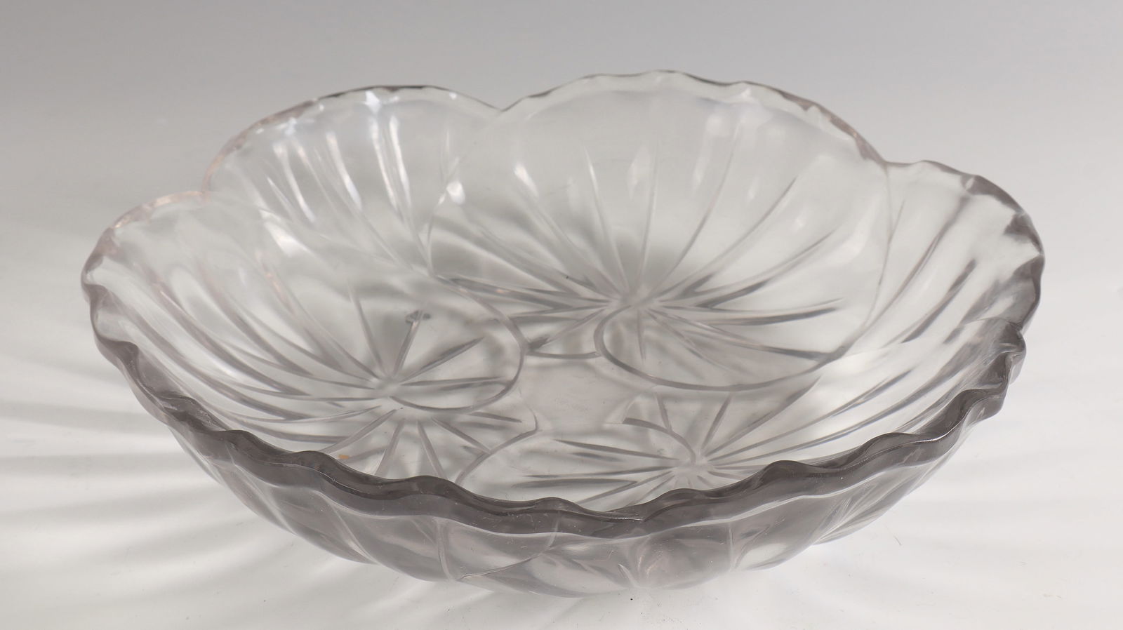 Bowl ''Lotus'': Bowl ''Lotus'' René Lalique, Wingen - sur - Moder, 1943 - 1944 Colourless glass, compressed, cut, engraved and polished. Ref.: LALIQUE FRANCE (sandblasted). D. 30 cm Lit.: G. Cappa, Le Genié