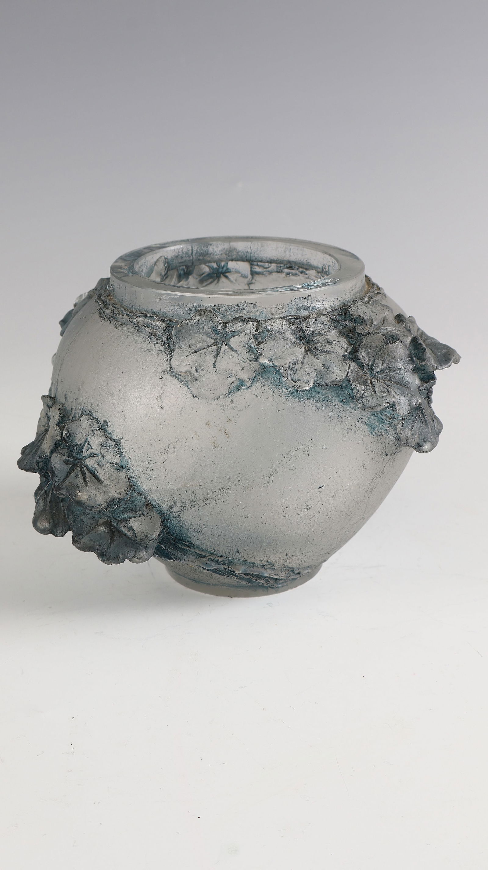 Rare and important vase ''Cire perdue'' (lost wax casting): Rare and important vase ''Cire perdue'' (lost wax casting) René Lalique, Wingen - sur - Moder, c. 1913 Colourless, thick-walled glass, partly patinated turquoise blue. Sculpturally carved foliage.