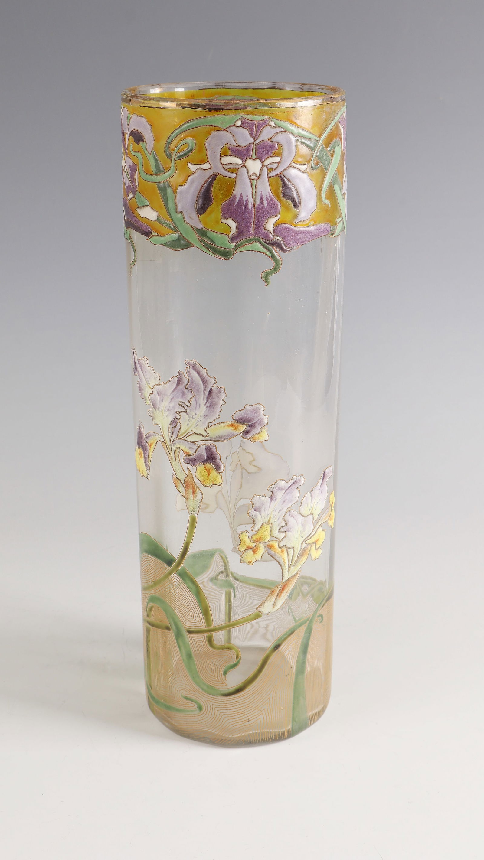 Cylinder vase with lily: Cylinder vase with lily Cristallerie de Pantin, around 1900 Colourless, optically blown glass with colourful opaque enamel painting. Contour and interior drawing in gold. H. 32 cm Lit.: G. Cappa, Le