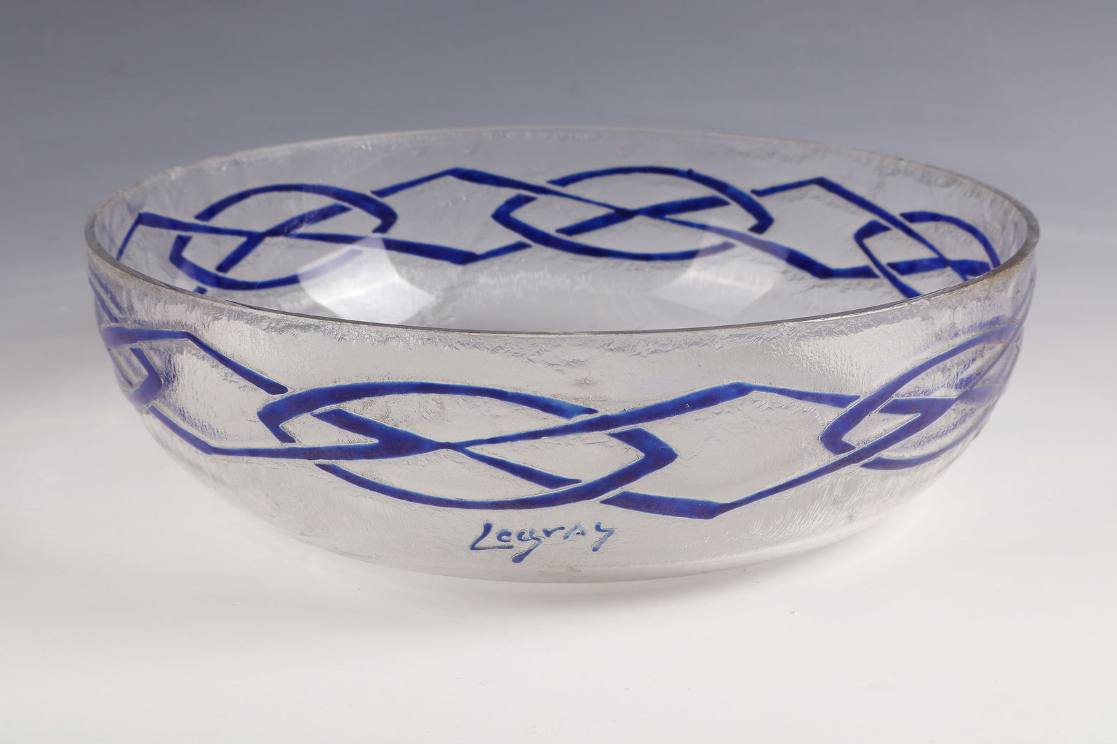 Shell: Bowl Legras, Verreries de Saint - Denis, 1921 - 1924 Colourless glass. Relief etched geometric decoration painted with blue opaque enamel. On the wall inscribed: Legras (highly etched, painted blue).