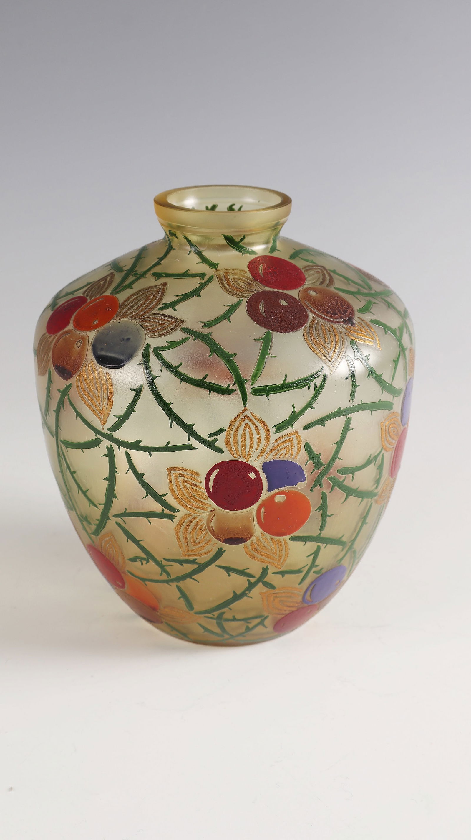 Vase: Vase Leune, around 1925 - Design: Auguste Heiligenstein Yellow-tinged glass. Relief-etched, stylized floral décor, painted with polished gold and colorful opaque enamel. On the wall inscribed: LEUNE