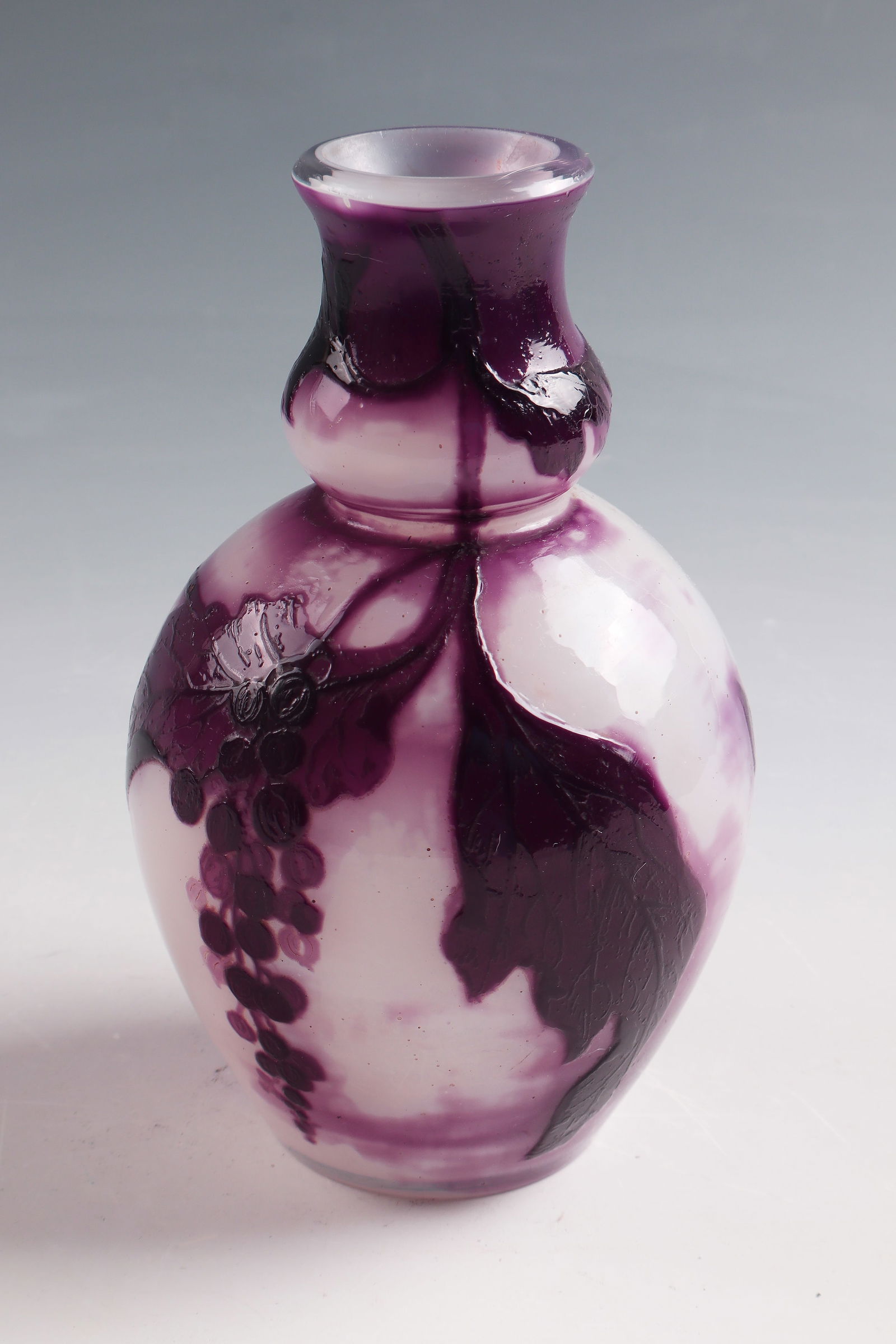 Vase ''Cassis'': Vase ''Cassis'' Muller Frères, Croismare, c. 1900 Colourless glass underlaid with milky white opal, violet overlay, acid-polished. Relief etched decoration: grapes with foliage. Underside inscribed: