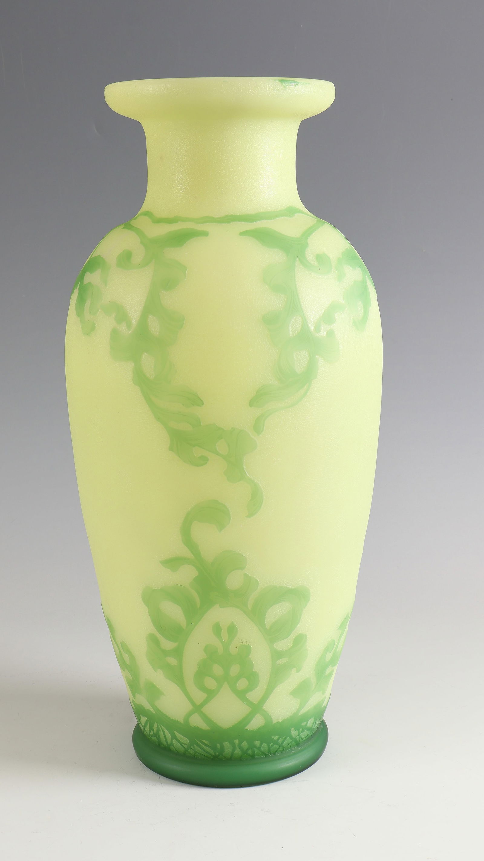 Large vase ''Chinois'': Large vase ''Chinois'' Cristallerie de Pantin, 1907 - 1908 opaque light green-yellow glass, green overlay. Relief etched décor. Reference: Ligature monogram & de Vez (etched). H. 41 cm Lit.: G. Cappa