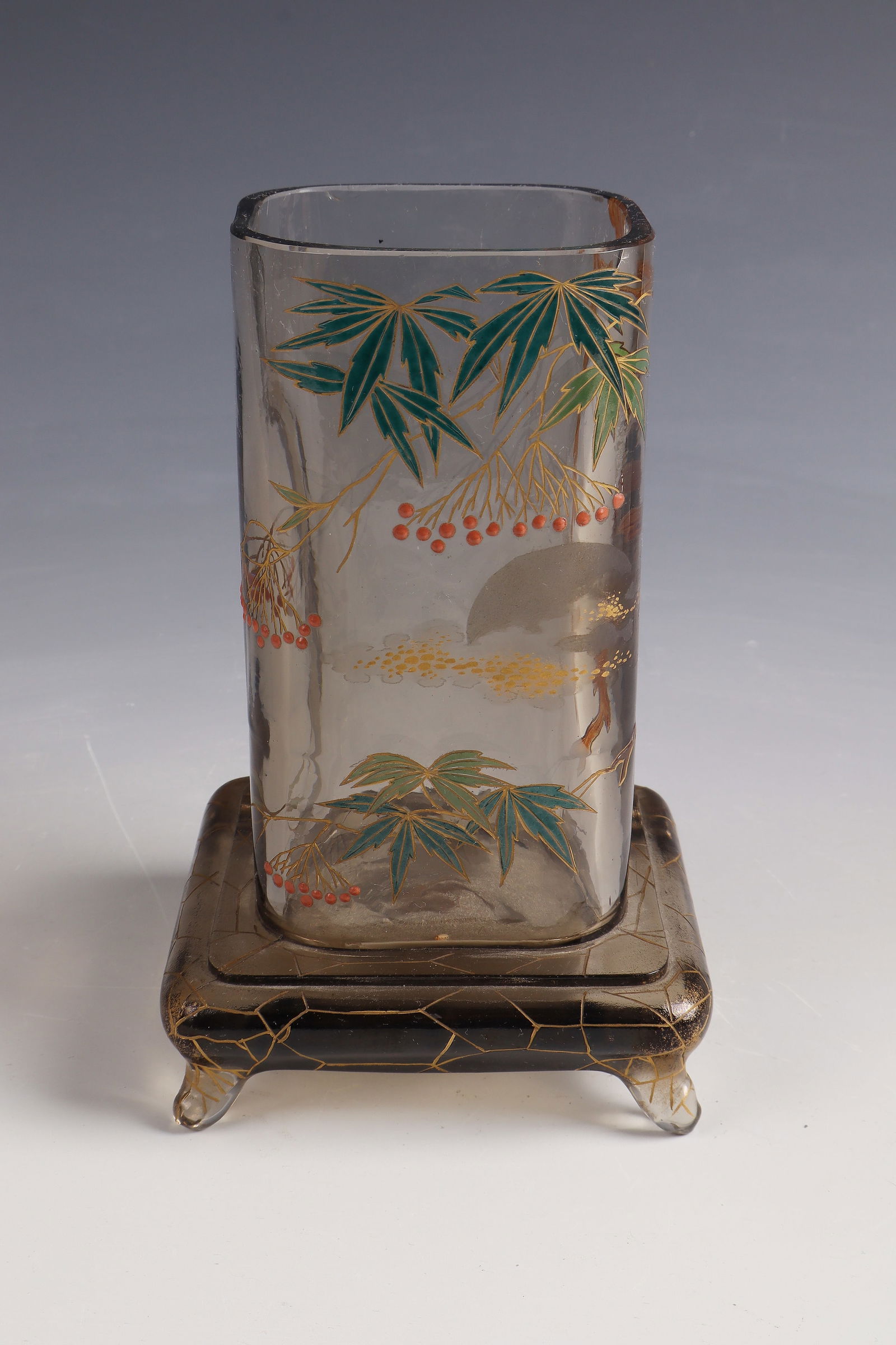 Foot vase (porte-pinceaux) with japonizing decoration: Foot vase (porte-pinceaux) with japonizing decoration Eugène Rousseau, Paris, 1878 - 1884 Smoked glass with multicolored opaque enamel decoration. Contour and interior drawing in gilded needle