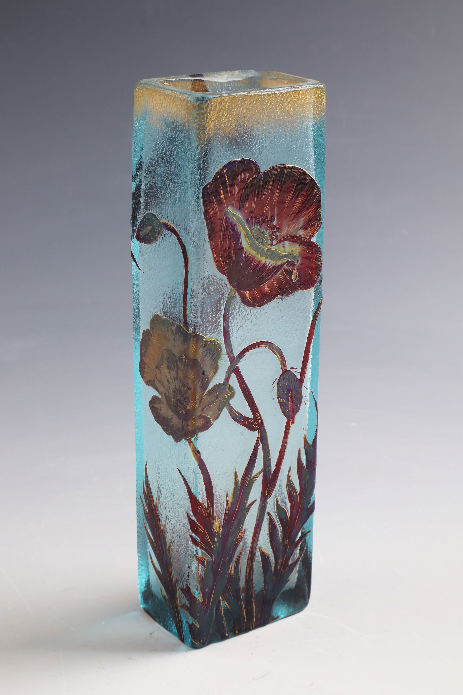 Square vase with poppies ''Pavots'': Square vase with poppy seeds ''Pavots'' Verrerie de Vallerysthal, c. 1890 Colourless, light blue tinted glass. Etched décor, painted in colorful opaque enamel and gold. On the lower wall inscribed: