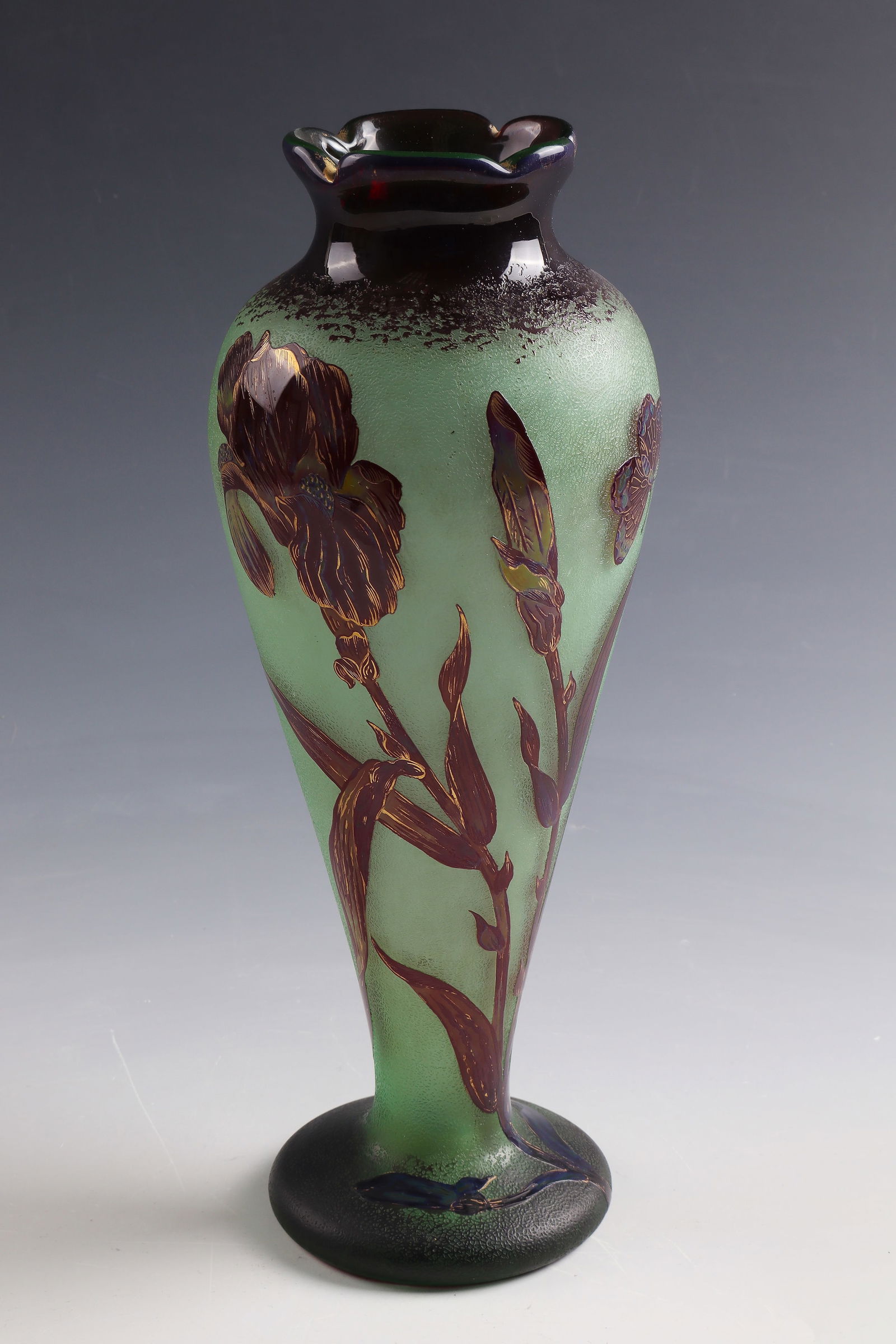 Baluster vase with iris and butterfly ''Aux iris rouges'': Baluster vase with iris and butterfly ''Aux iris rouges'' Verrerie de Vallerysthal, 1889 - 1894 Green, ruby red overlaid glass, etched. Interior drawing in gold and needle etching. Underside inscribed