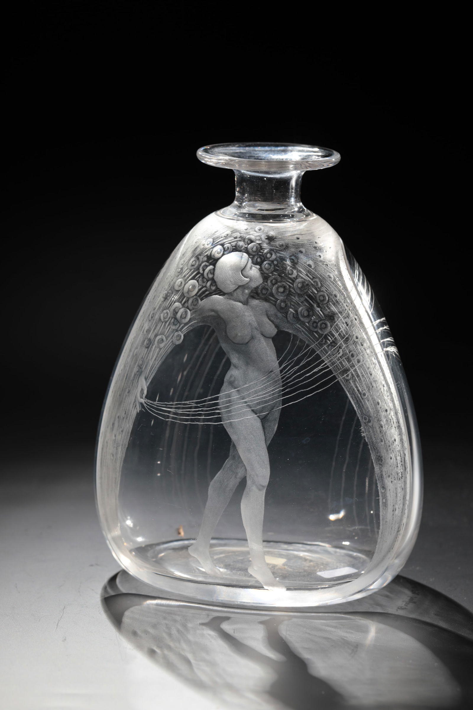 Vase with Female Nude with Peacock Feather ''Femme paon'': Vase with Female Nude with Peacock Feather ''Femme paon'' Cristalleries du Val Saint - Lambert, 1925 - 1926 - Design: Charles Graffart Colourless glass with partly blown deep cut. Underside