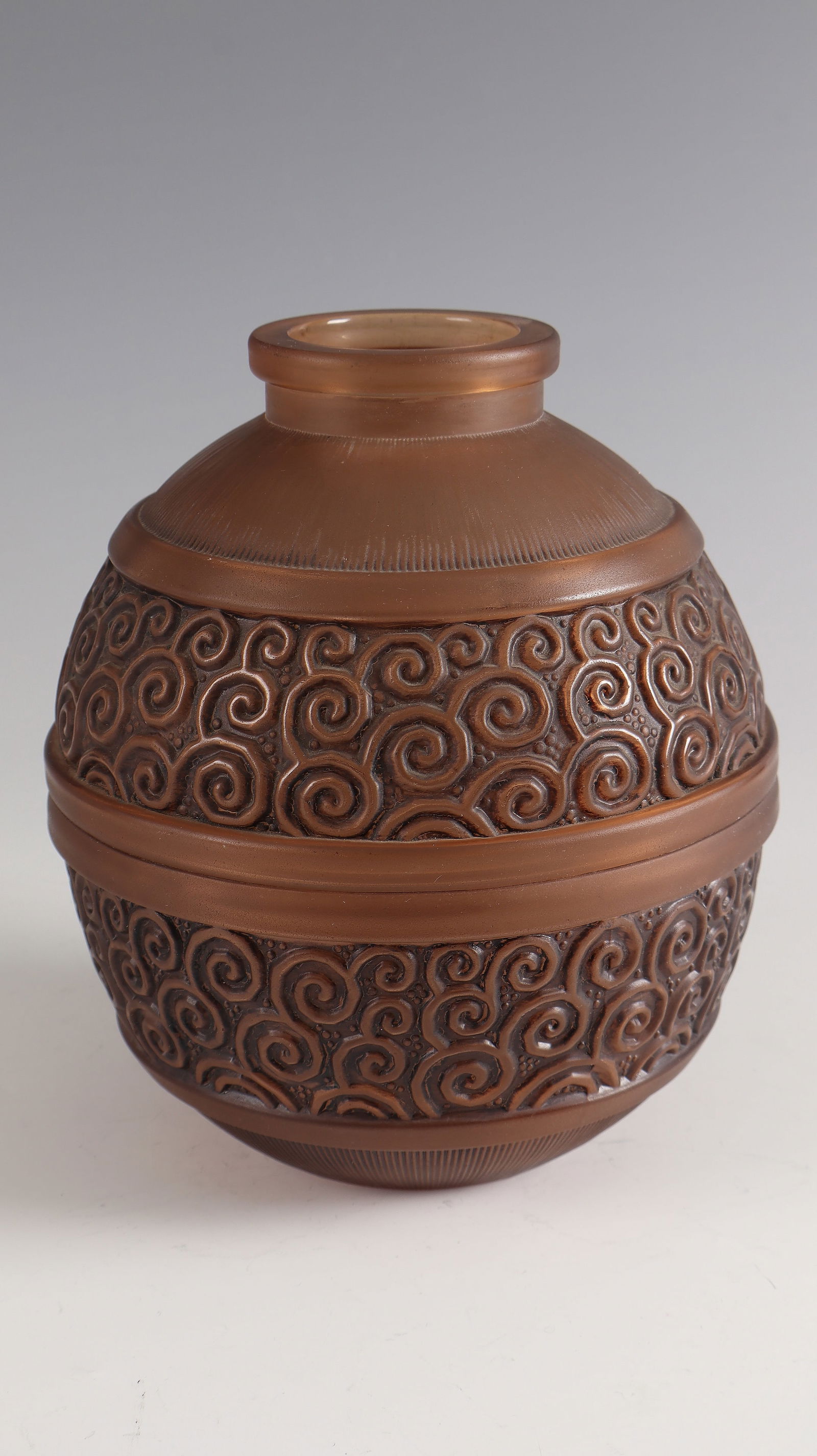 Vase ''Mimosas'': Vase ''Mimosas'' Val Saint - Lambert, 1933 Colourless glass, moulded, patinated brown and graphite grey. Underside inscribed: VSL (painted in black flat paint). H. 19 cm Lit.: G. Cappa, Le Genié