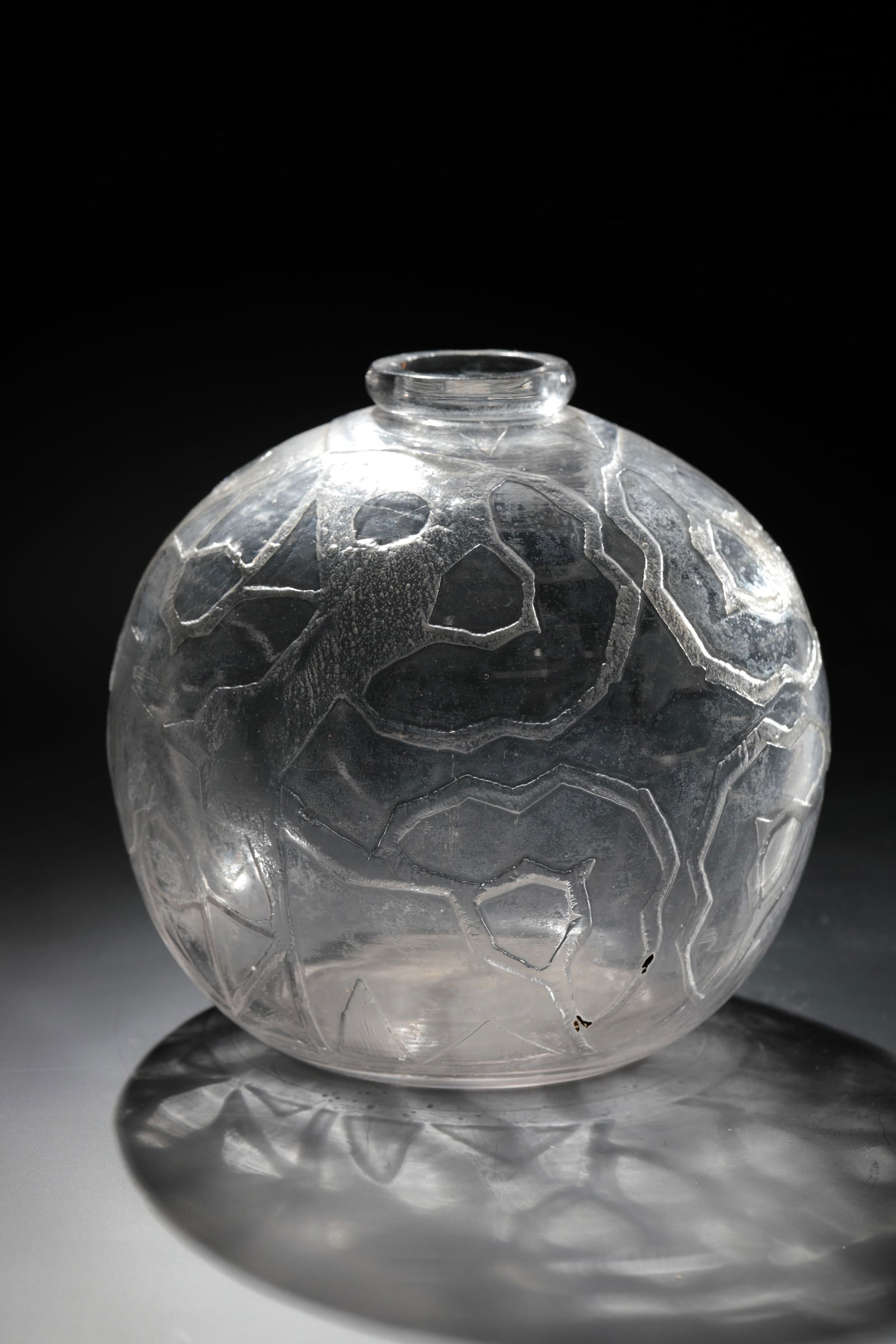 Spherical vase: Spherical vase France, c. 1930 Colorless glass with relief etched geometric decoration. Reference: JVA (etched). muzzle rim. H. 17.5 cm