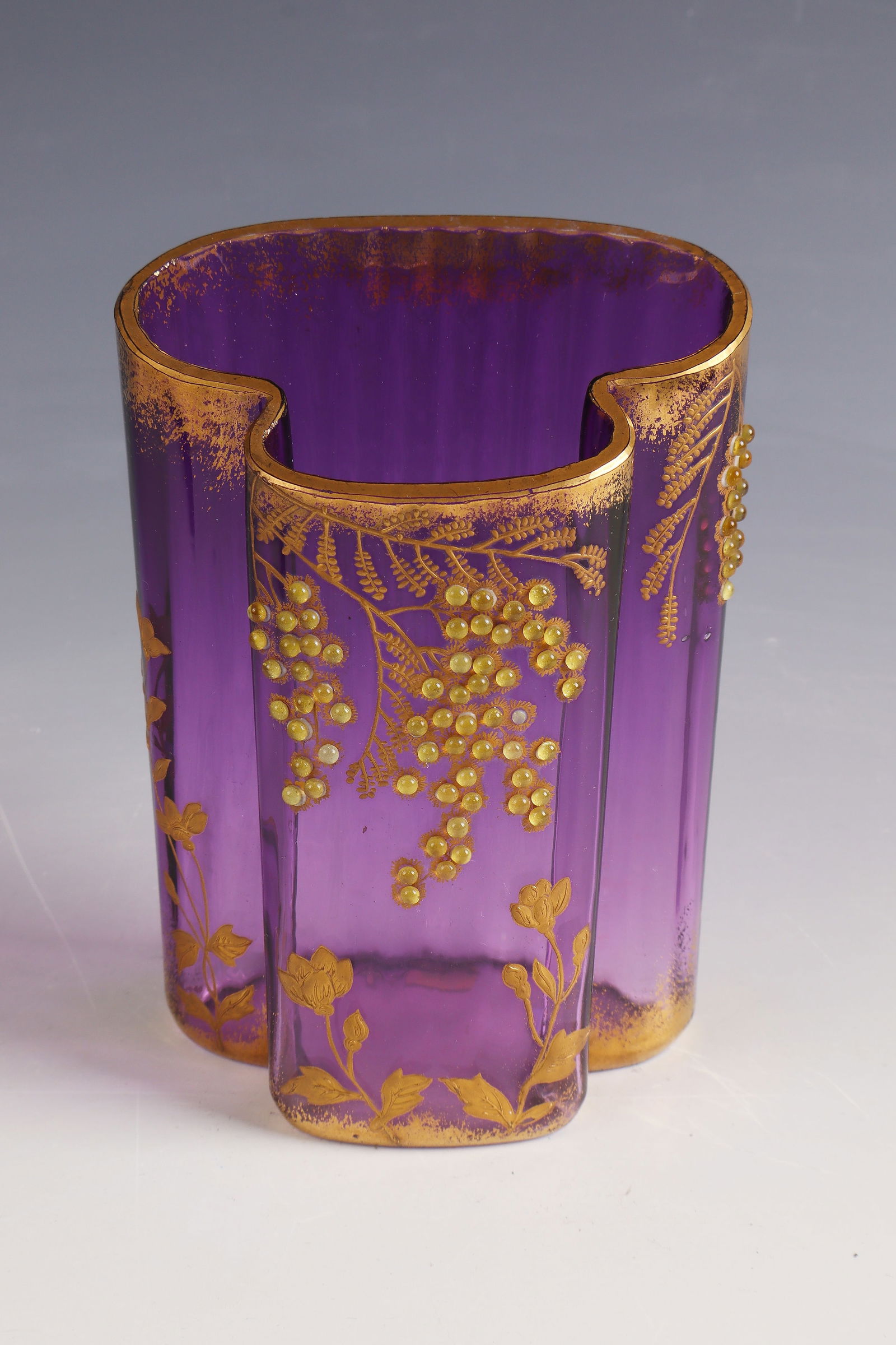 Vase ''Mimosas'': Vase ''Mimosas'' L. Moser (engraved), Karlovy Vary, 1890 - 1900 Violet glass, with applied glass beads, polished and relief gold painting. H. 15.5 cm Lit.: G. Cappa, Le Génie Verrier de l'Europe, ed.