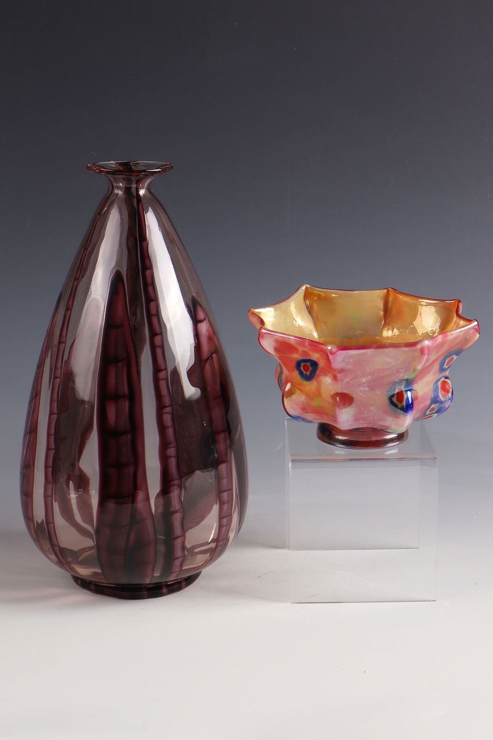Vase and bowl: Vase and bowl Wilhelm Kralik Sohn, Eleonorenhain, 1925 - 1930 Colourless and white opal glass, covered with violet ribbon and ruby-pink crumble melting as well as three-coloured plates 'Murrine' cut