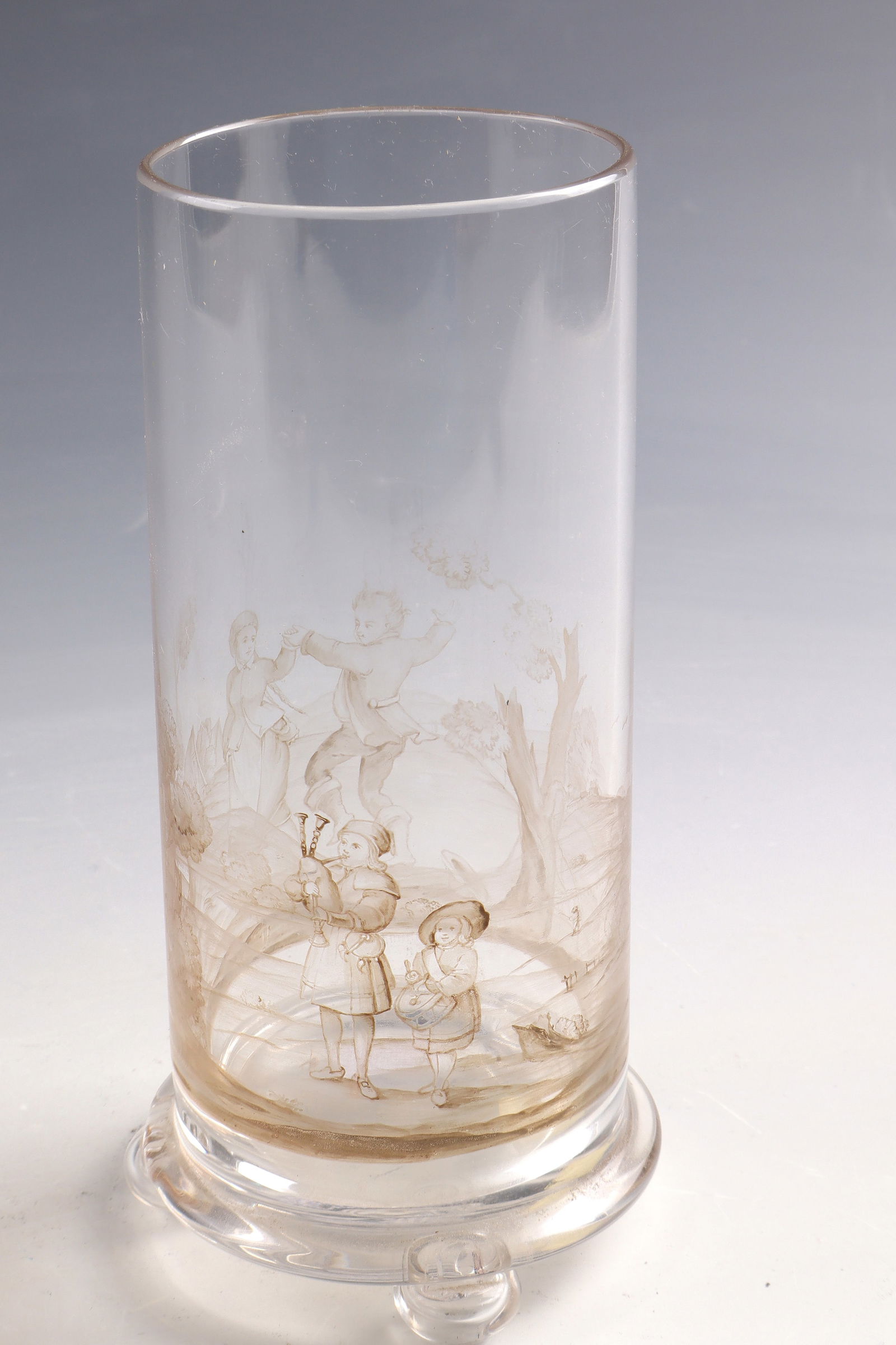 Beaker vase on spherical feet with peasant dance: Beaker vase on spherical feet with peasant dance J. & L. Lobmeyr, Vienna, c. 1880 Colourless glass with brown transparent enamel painting. Underside inscribed: Lobmeyr signet (painted in colourless en